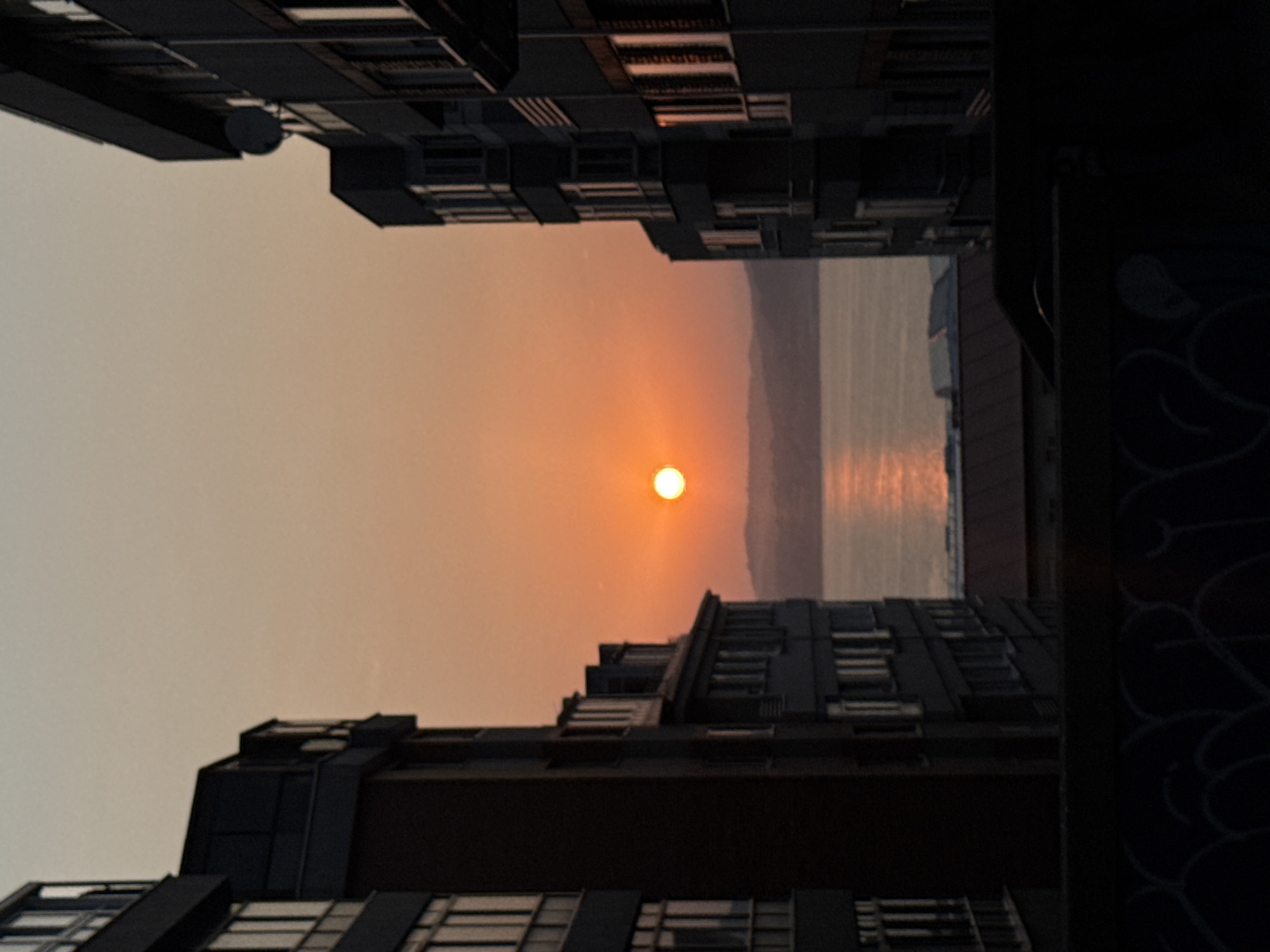 Sunset over Ría de Vigo, plus an elevator selfie