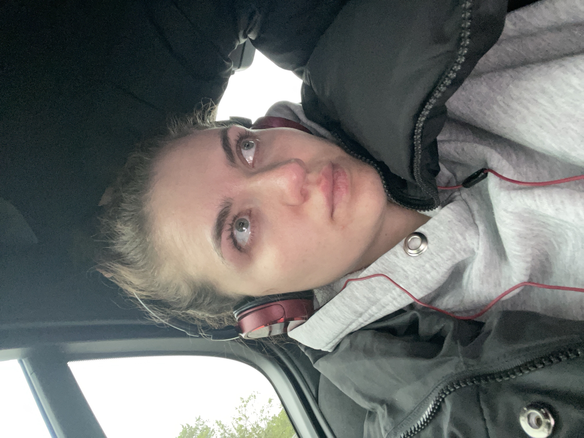 Woman in headphones observed in car in Kommunarka