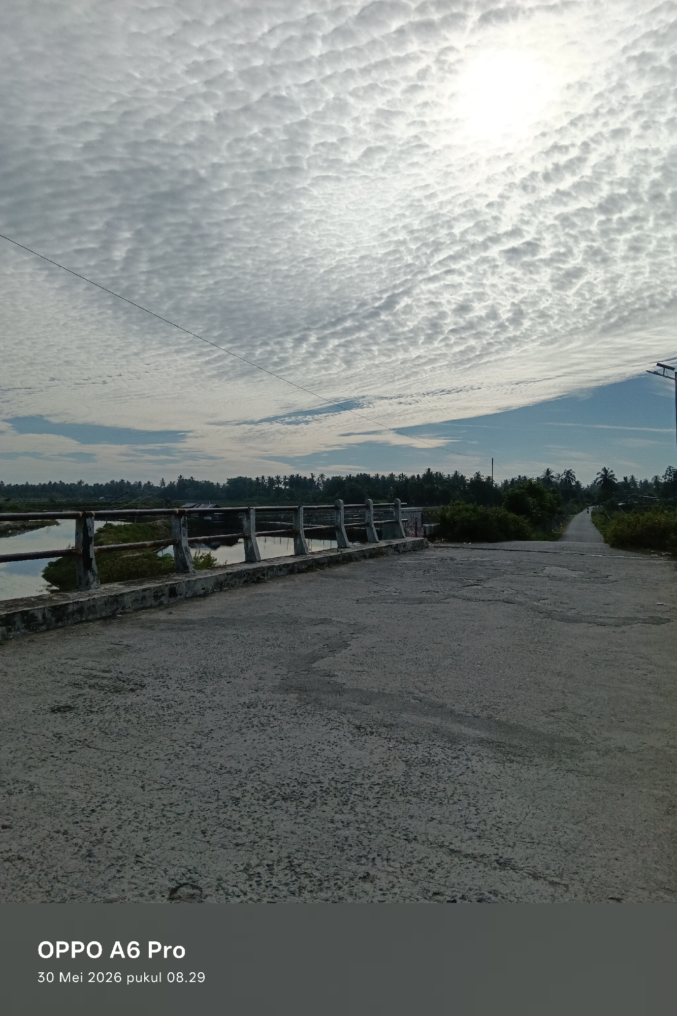 Morning sky and infrastructure documented in Blangtumulek, Indonesia