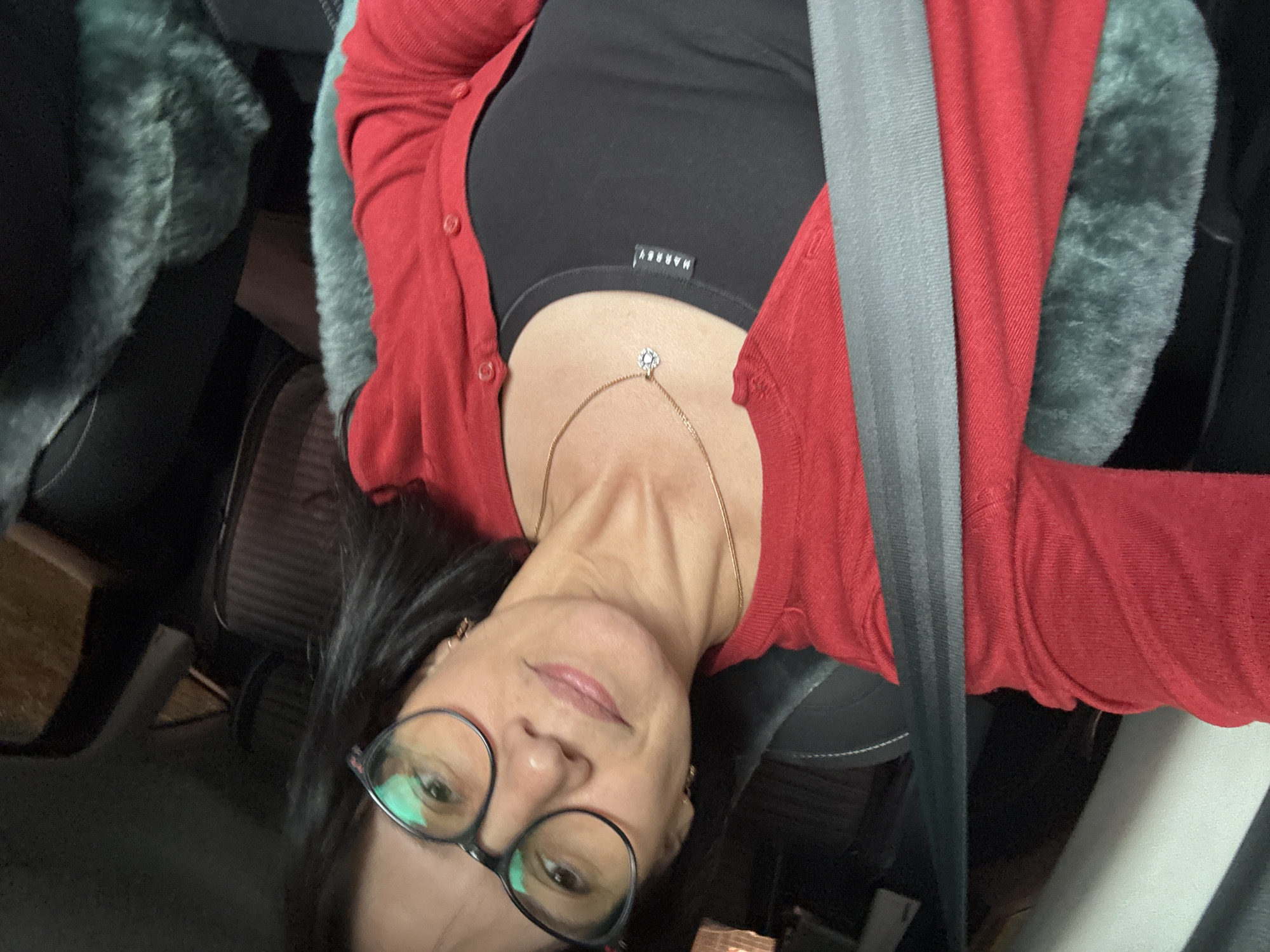 Woman photographed inside car in Chaikovsky, Russia