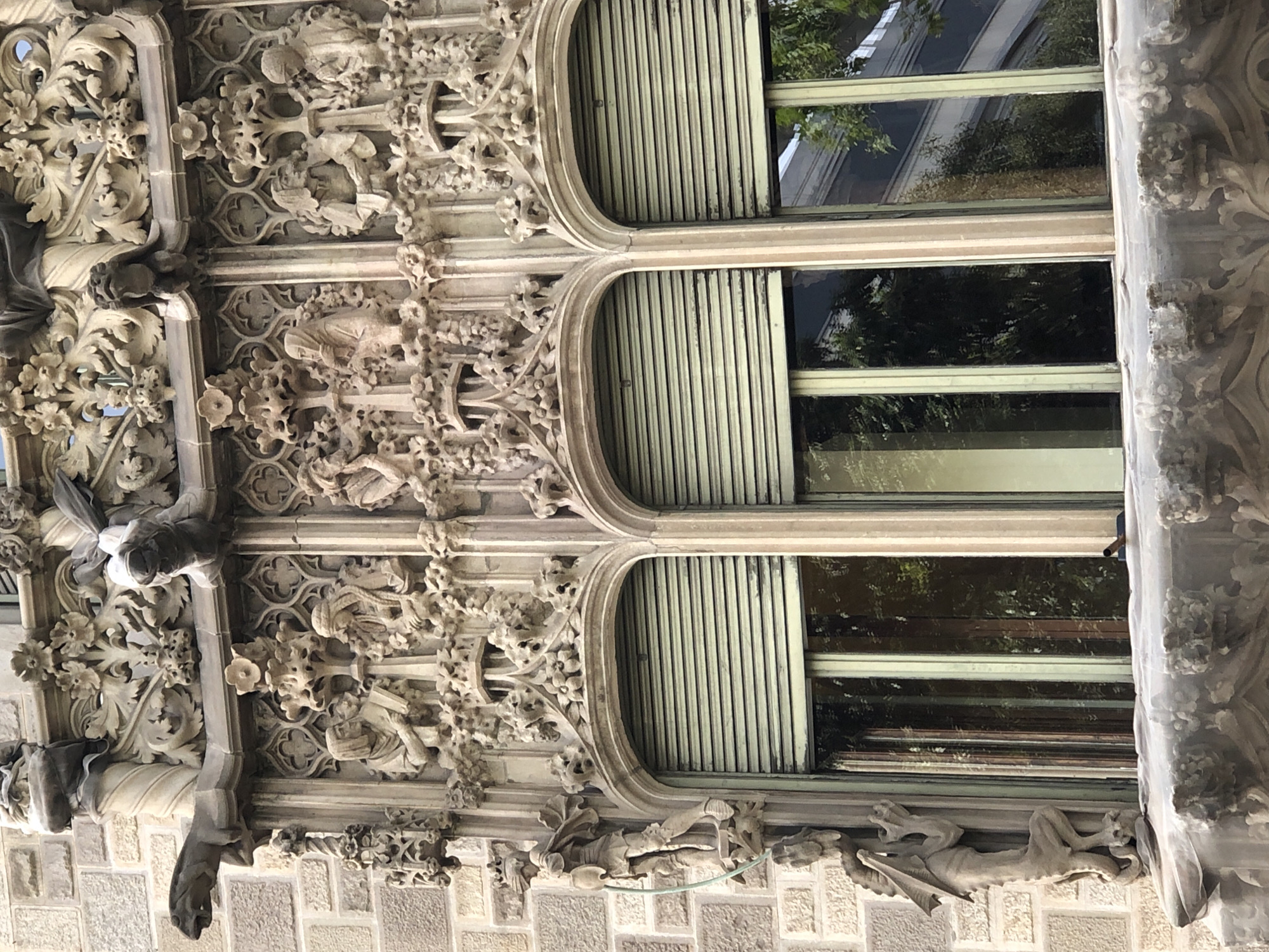 Morning urban walk captures historic architecture and cat feeding