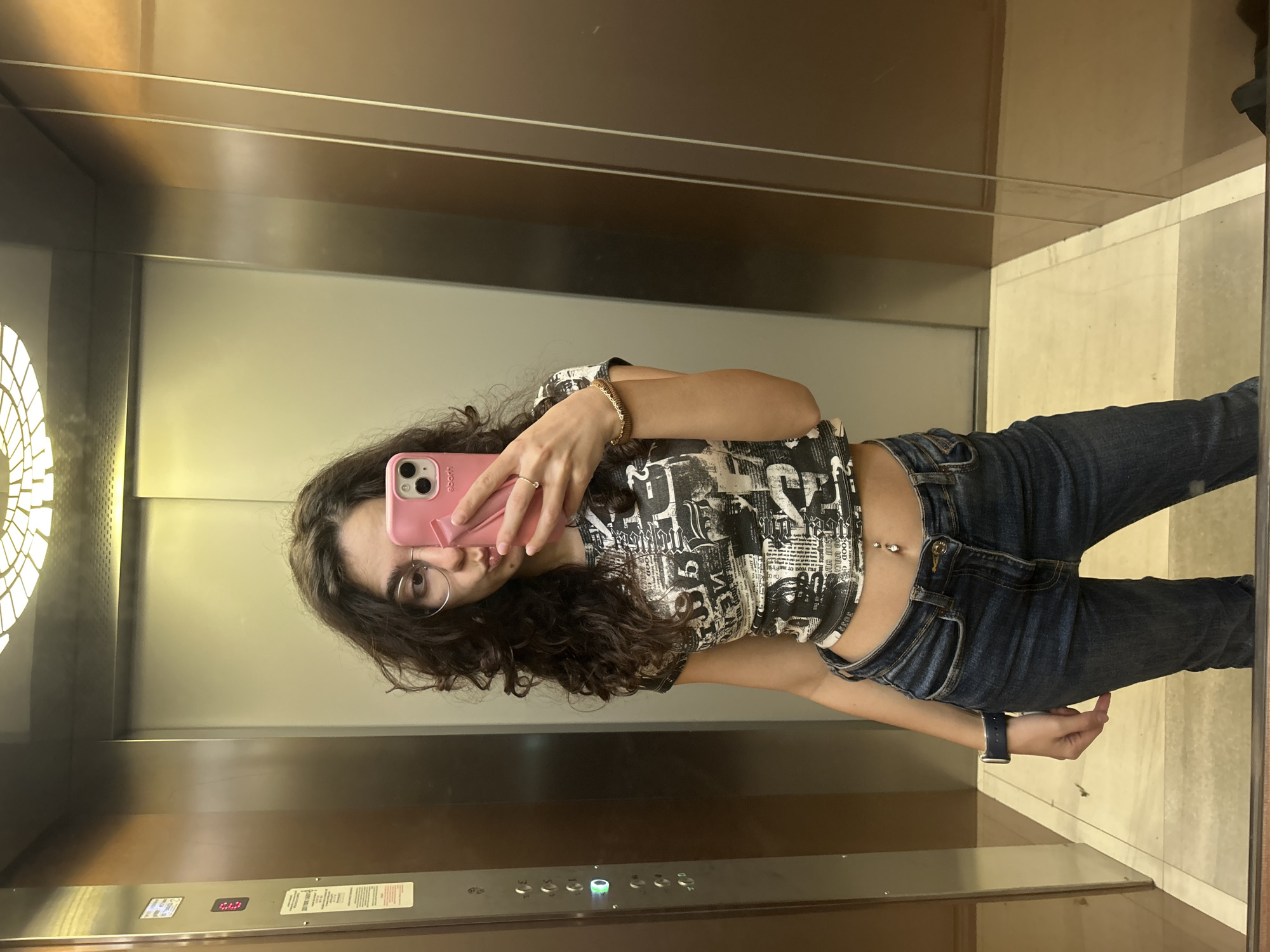 Woman takes selfie in Sofia elevator