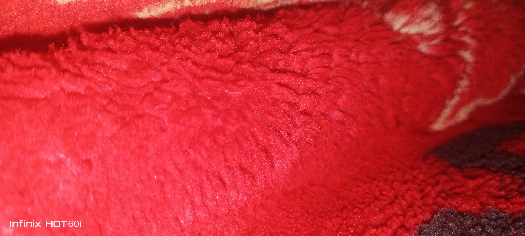 Close-up of red textured fabric photographed in Libya