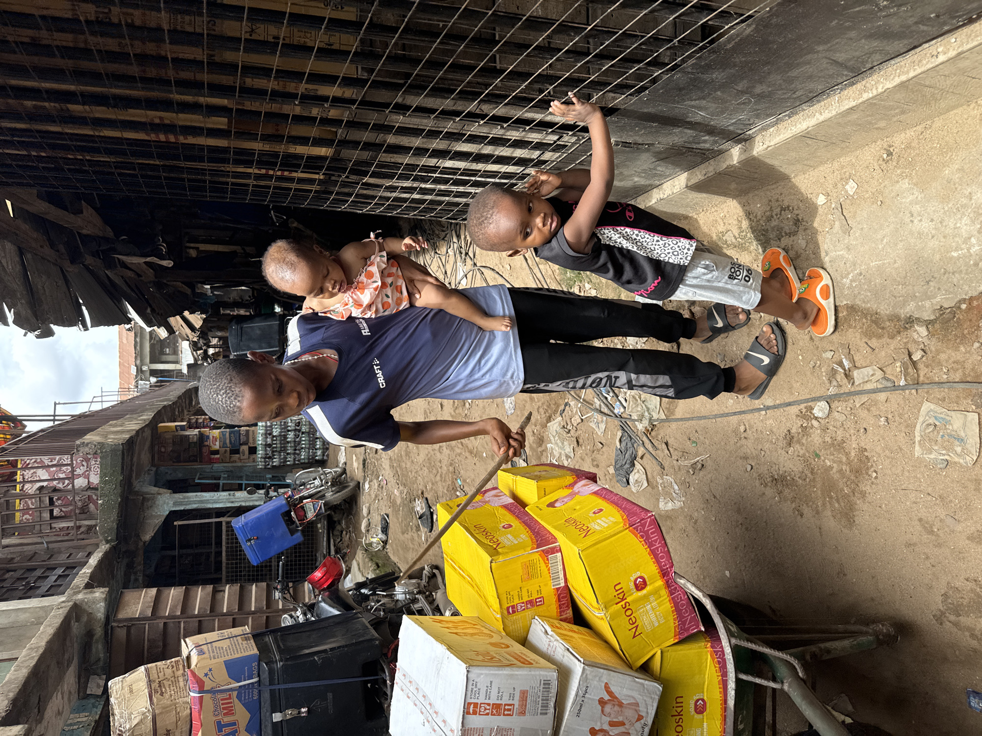 Street barber, daily life documented in Onitsha, Nigeria