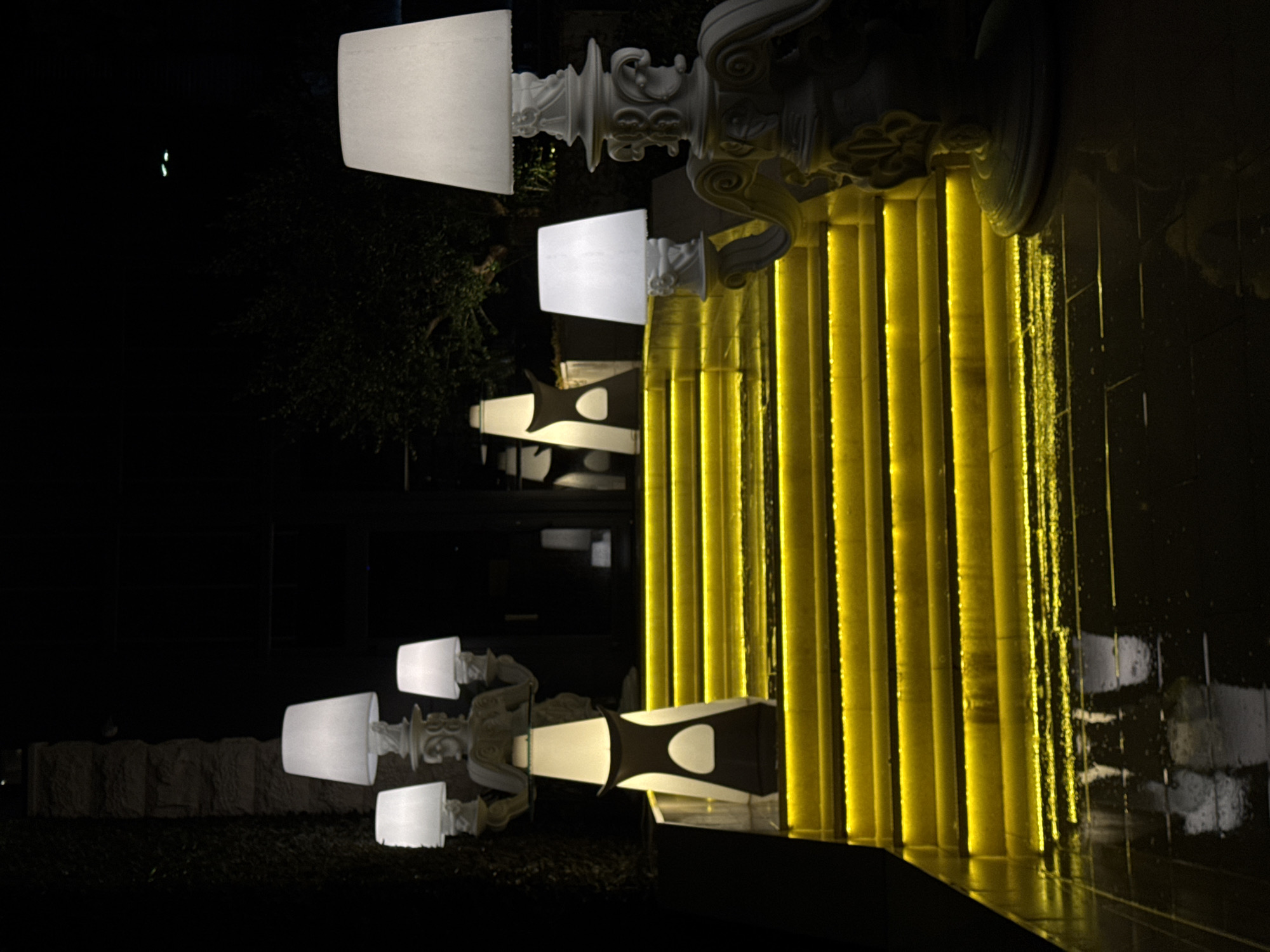 Night scenes captured across wet Budva streets and establishments