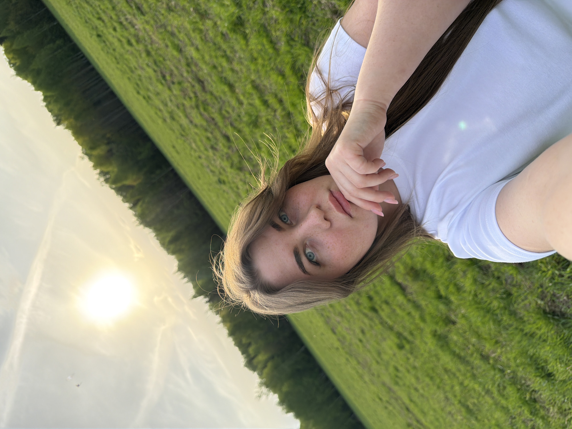 Woman photographed in field near Zlodar', Russia
