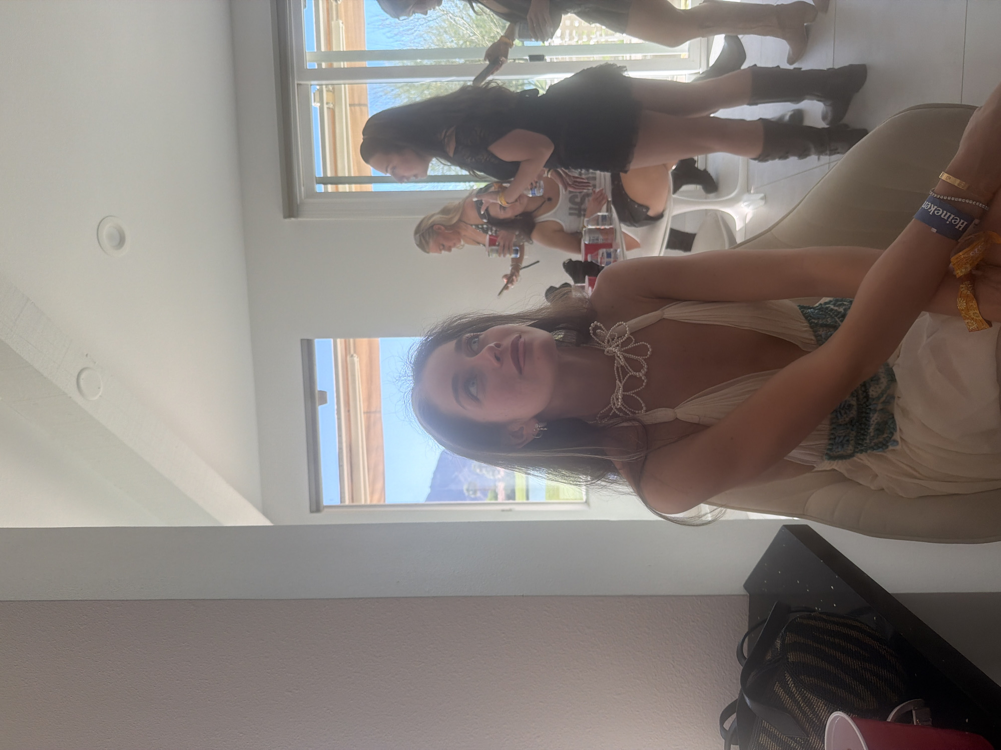 Young women gather indoors in La Quinta, California