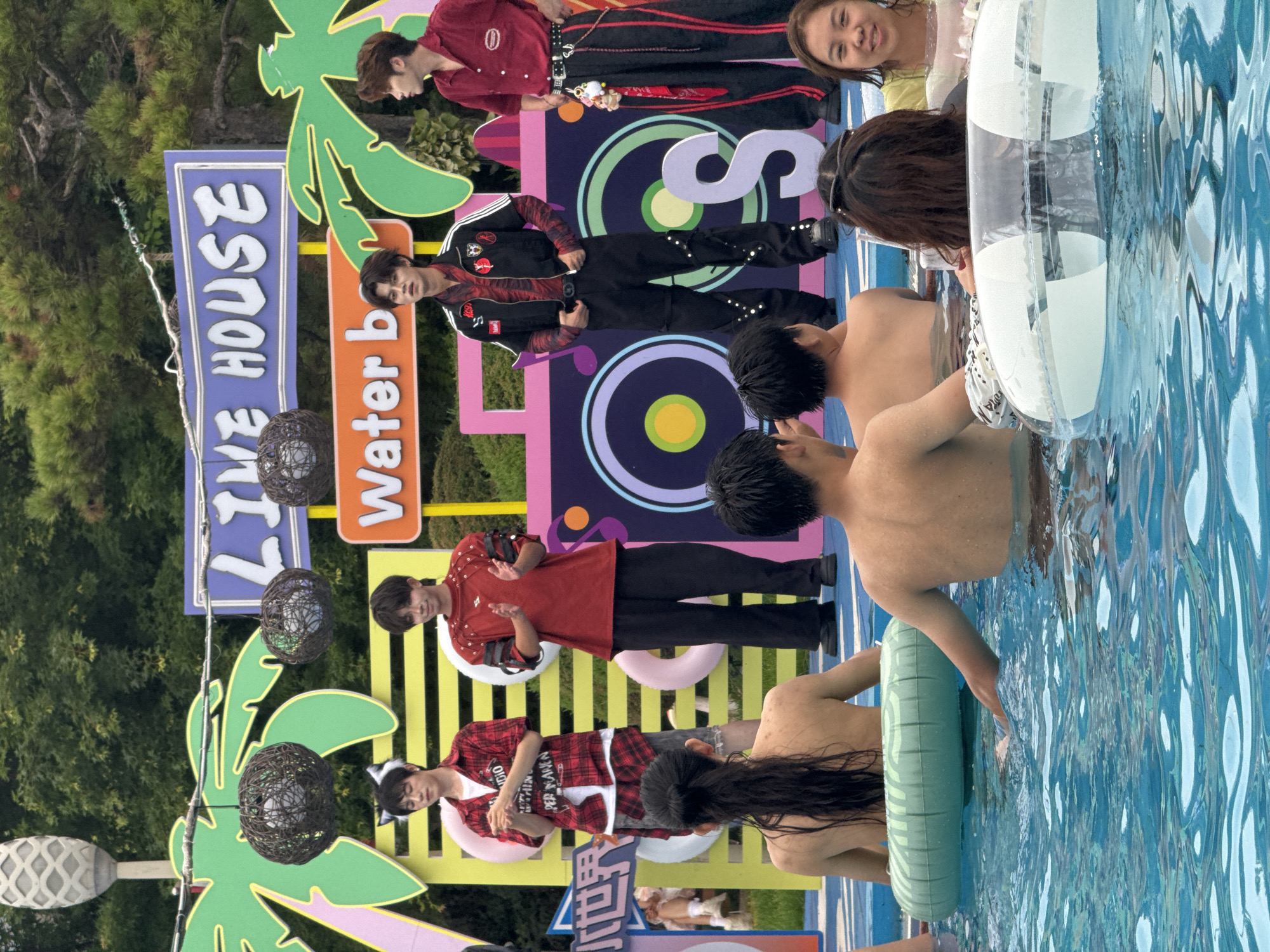 Live poolside performance at a summer water park event in Taihe