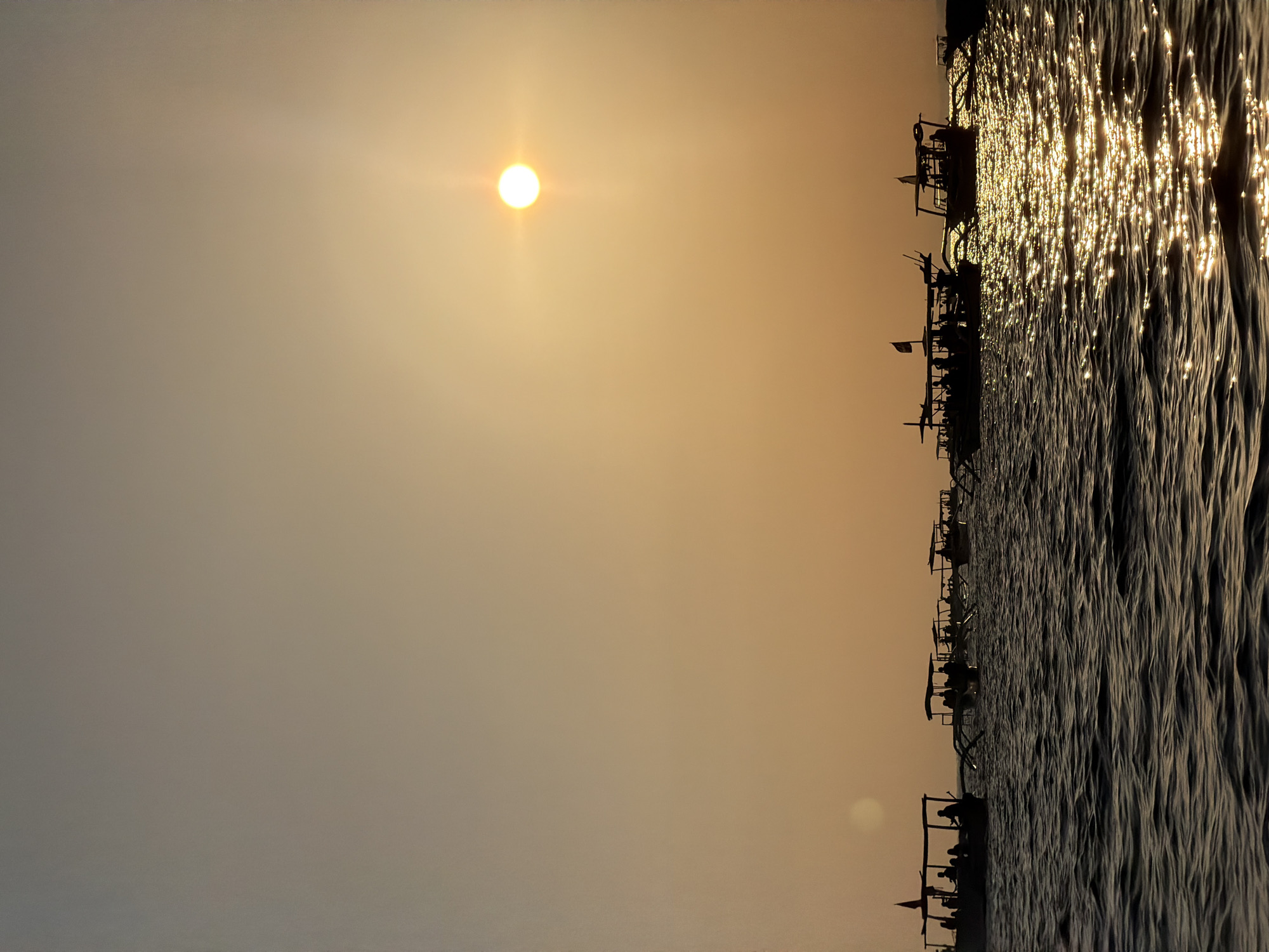 Traditional boats on the water at sunset, Buleleng, Indonesia