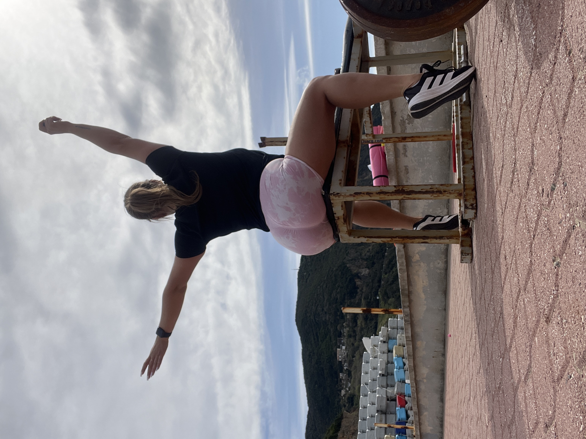 Woman performs outdoor weight training routine in Montenegro