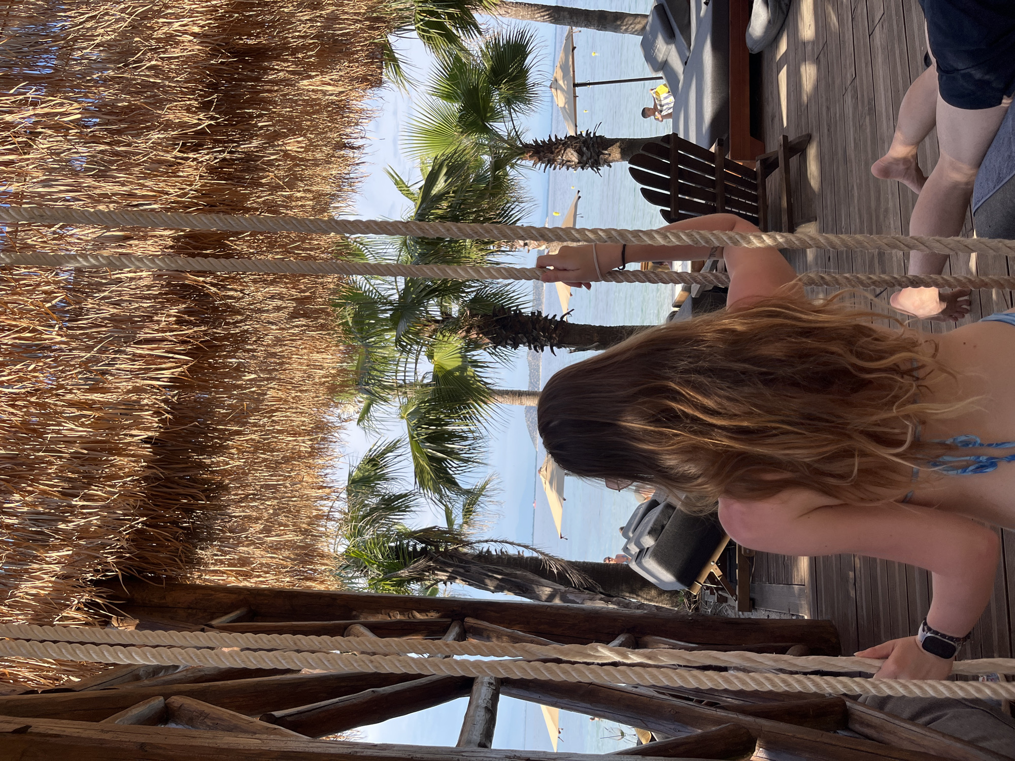 Woman enjoys afternoon at Thassos beach resort in Greece
