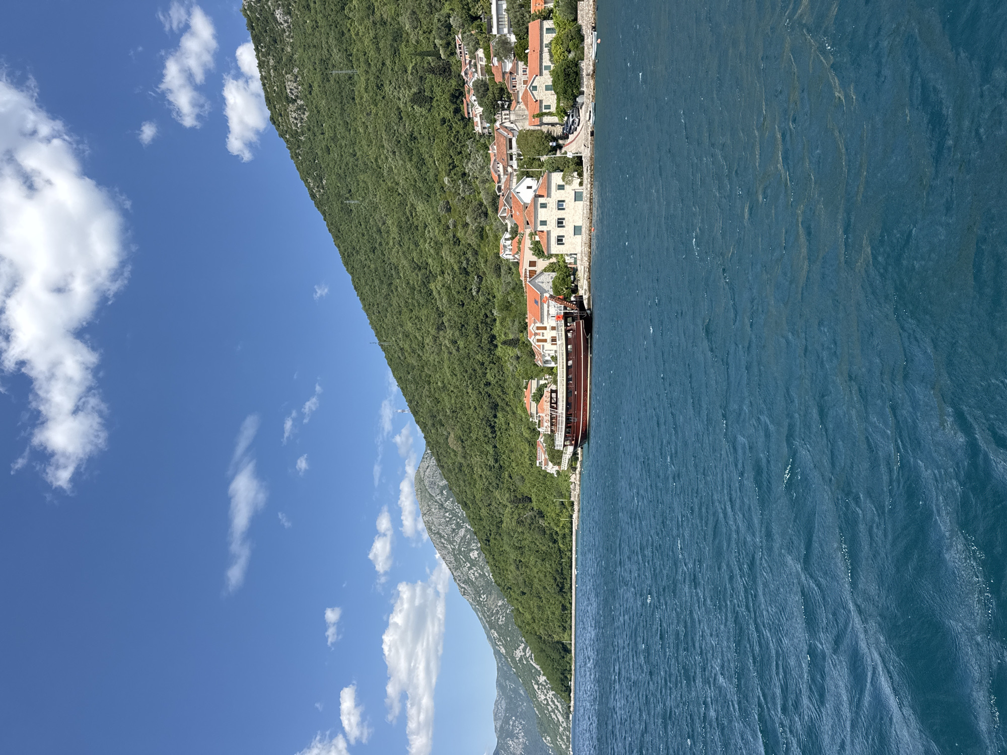 Boat trip captures scenic Bay of Kotor coastline views