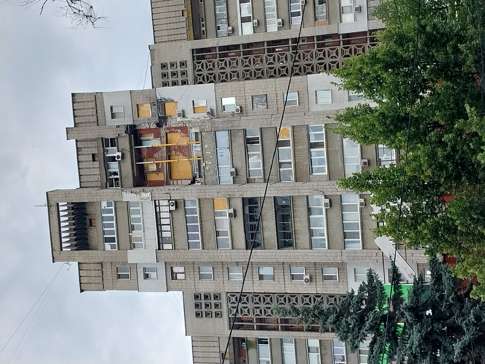 Dnipro street-level scenes mix daily life with shelling damage