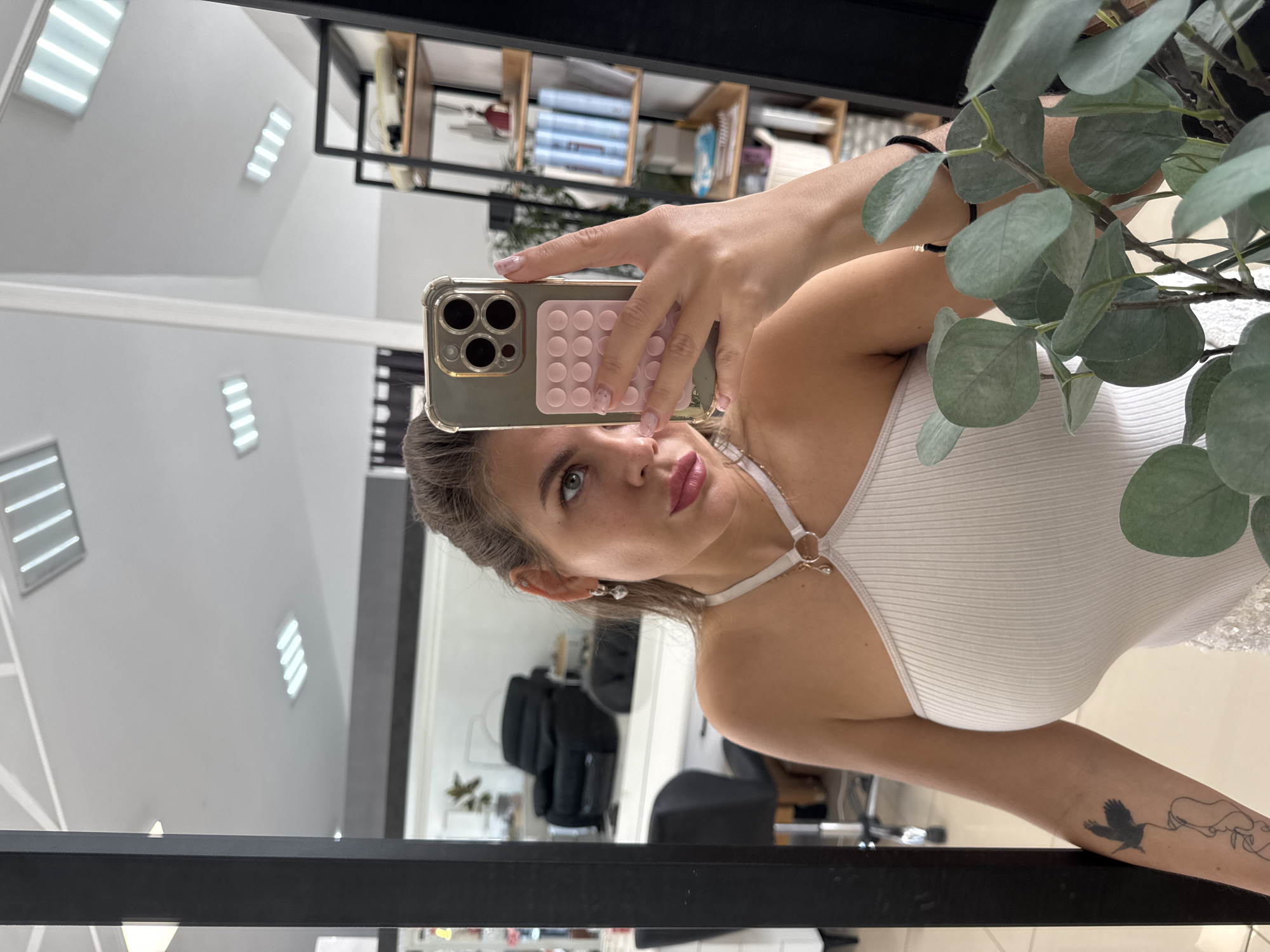 Mirror selfie session at a Chaikovsky salon, July 2026