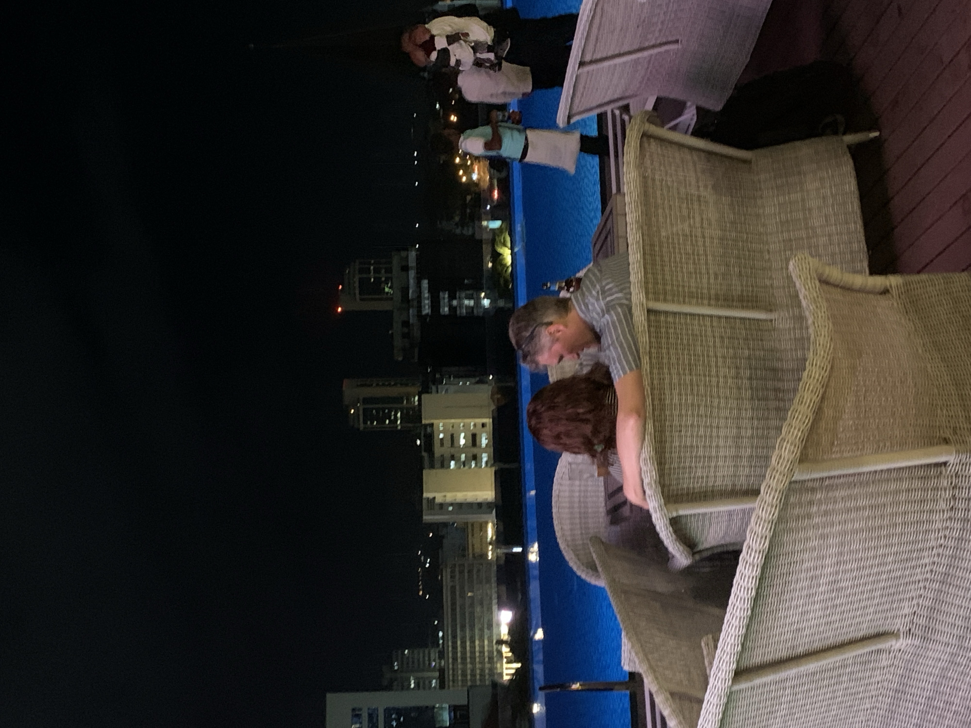 Evening dining gathering at Dar es-Salaam rooftop restaurant