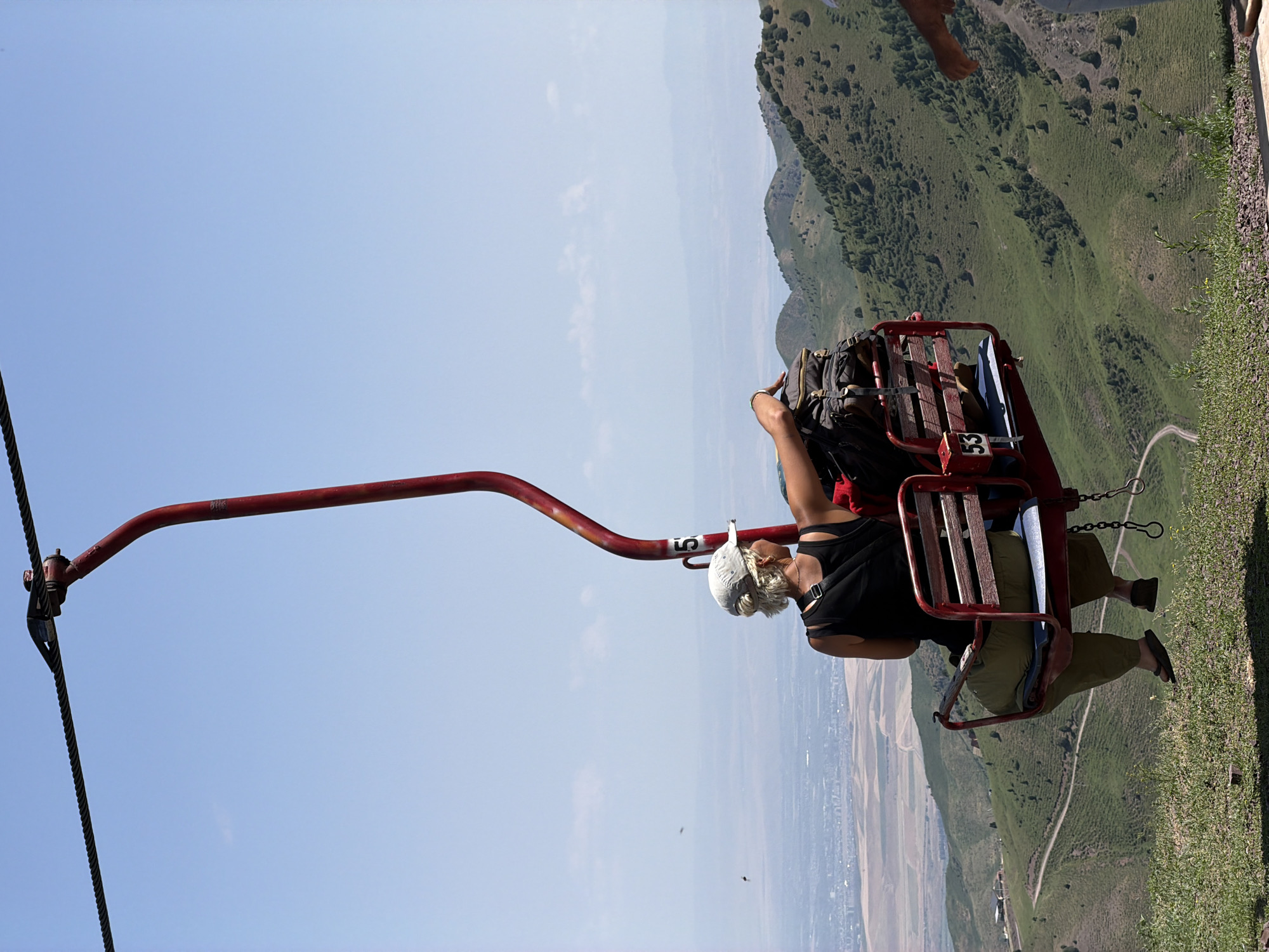 Vintage chairlift running through Kyrgyzstan's green mountain slopes