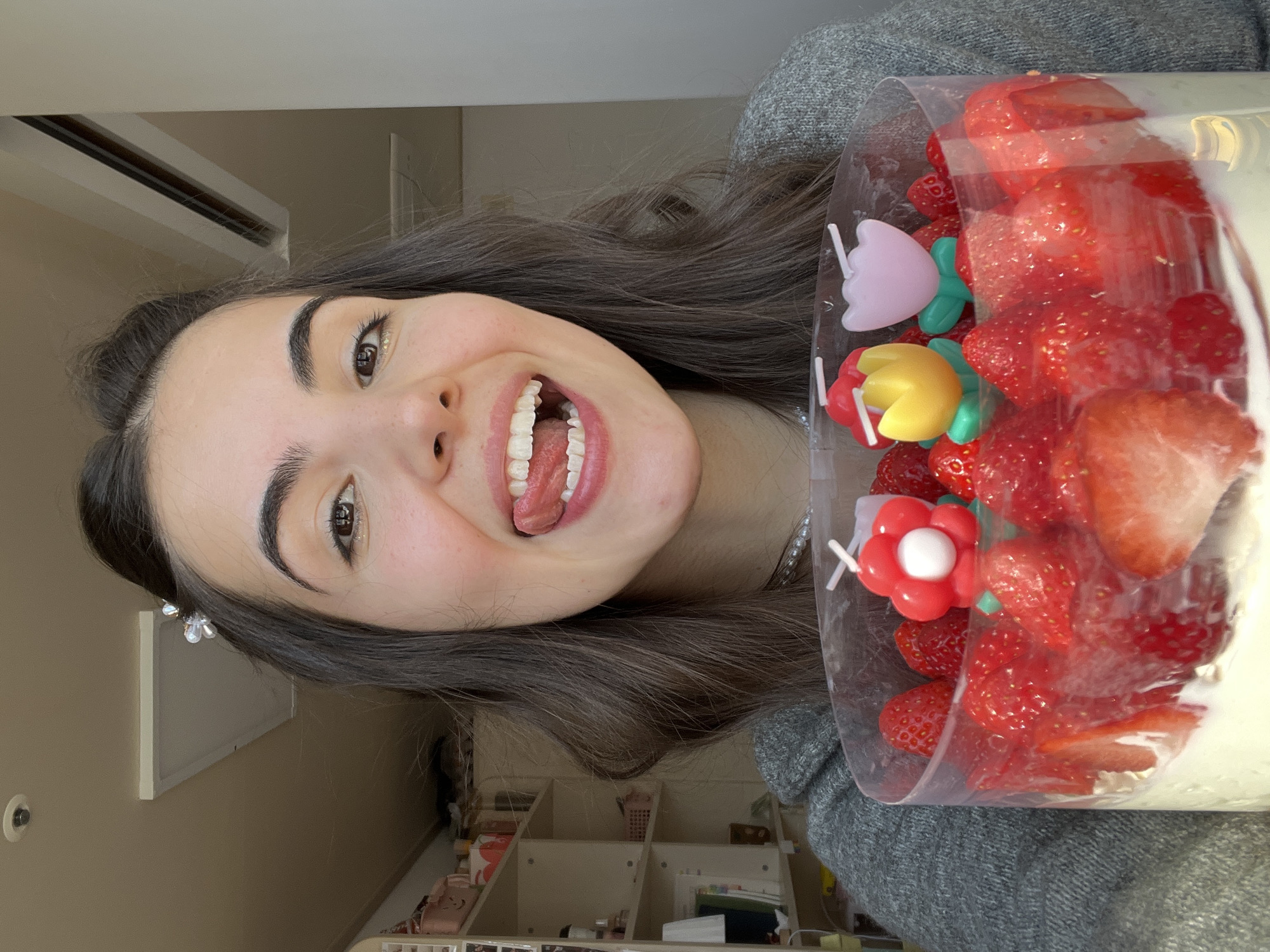 Woman celebrates with strawberry cake in early morning Daegu