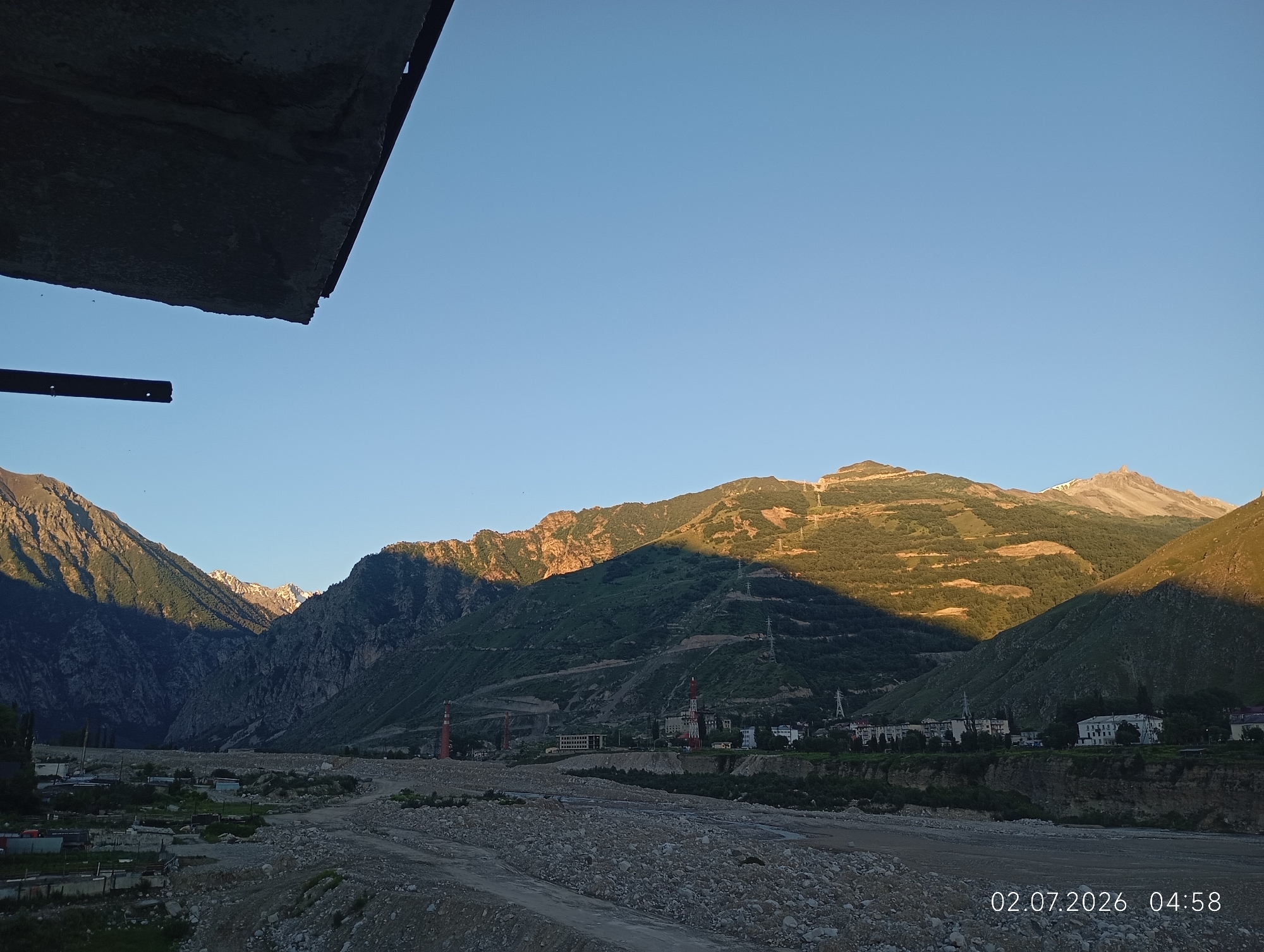 Golden morning light across the Caucasus mountains near Tyrnyauz