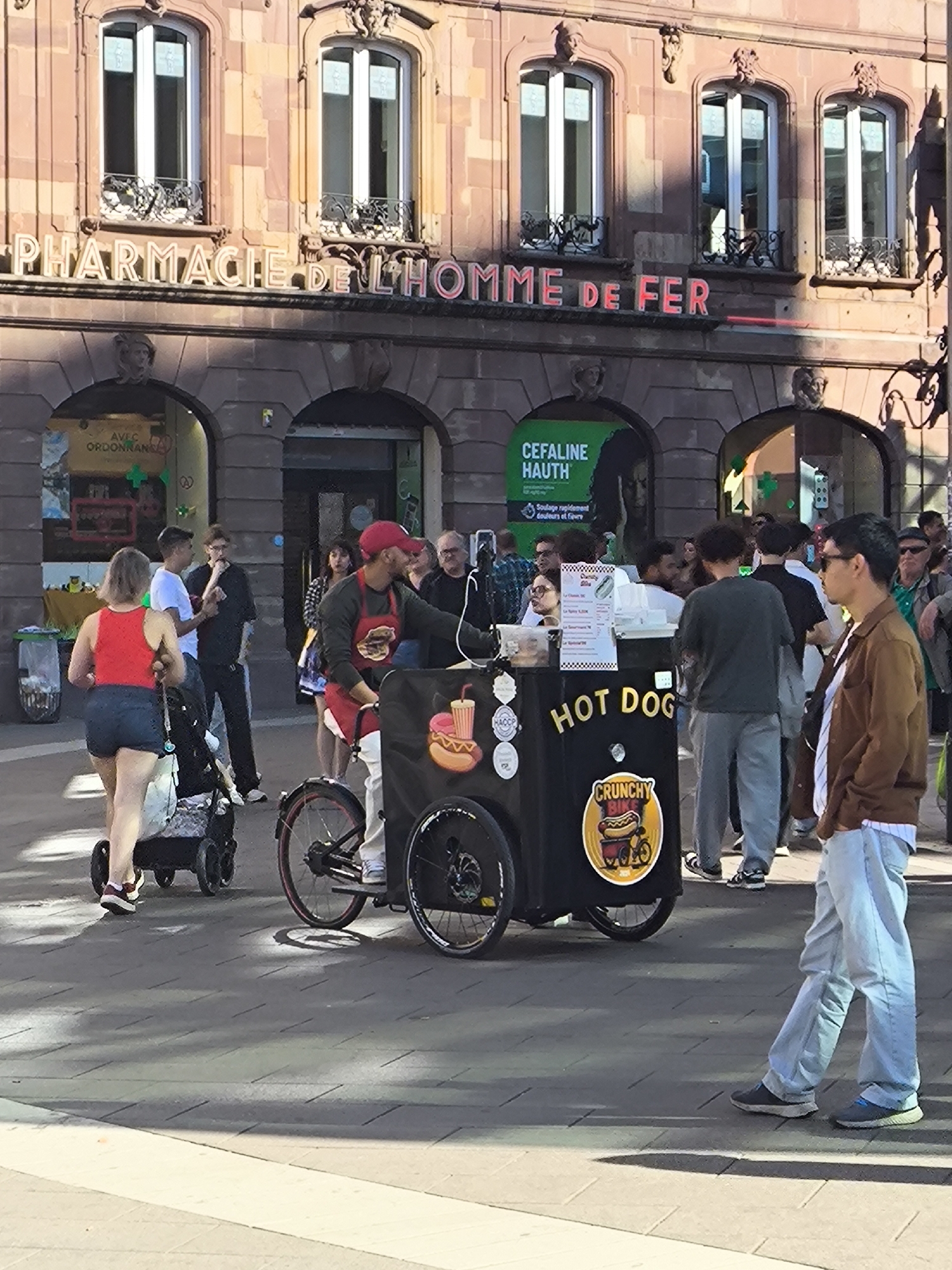 Ordinary afternoon street life documented across central Strasbourg