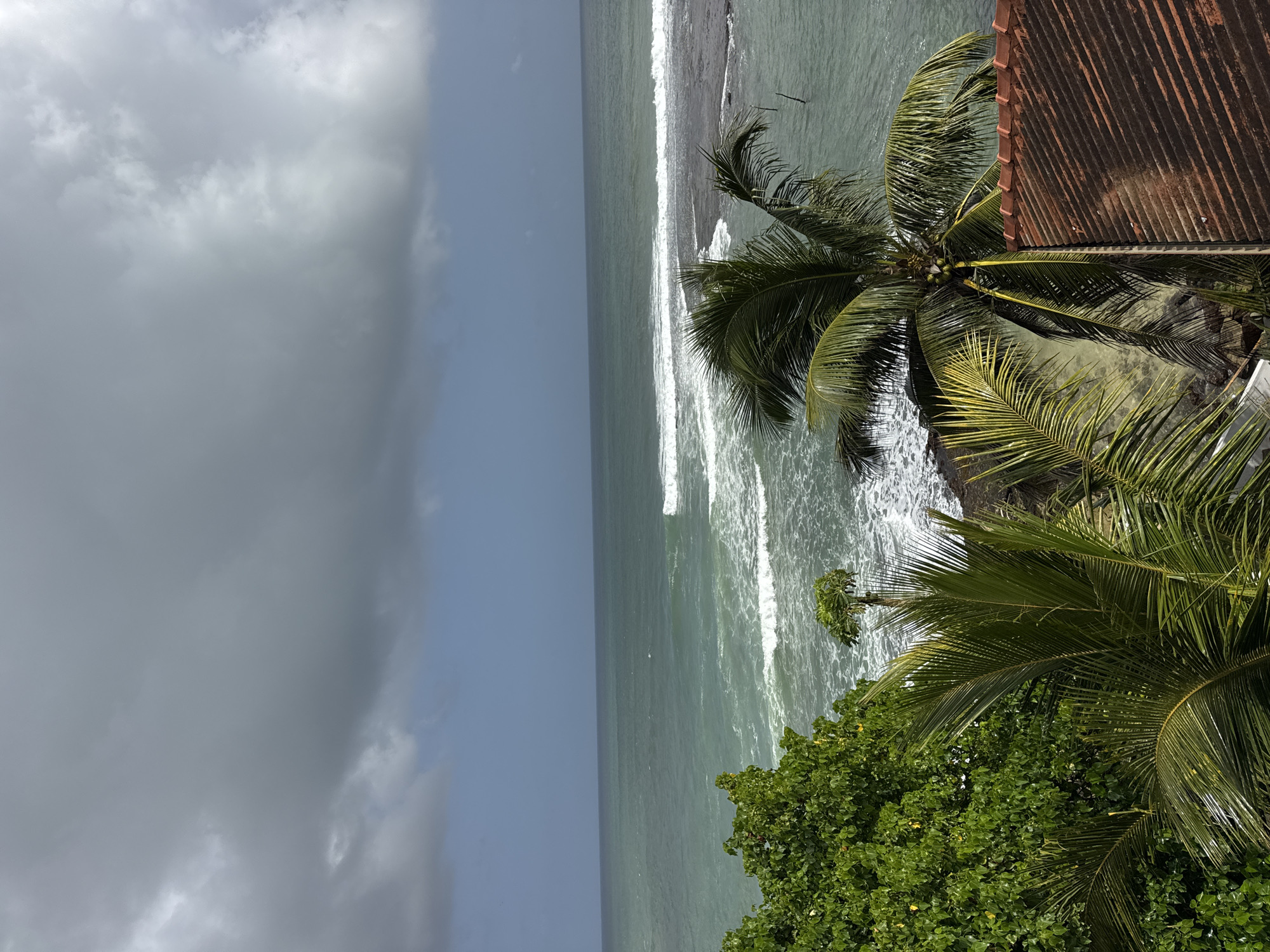 Stormy skies over the Indian Ocean at Goviyapana's rocky coast