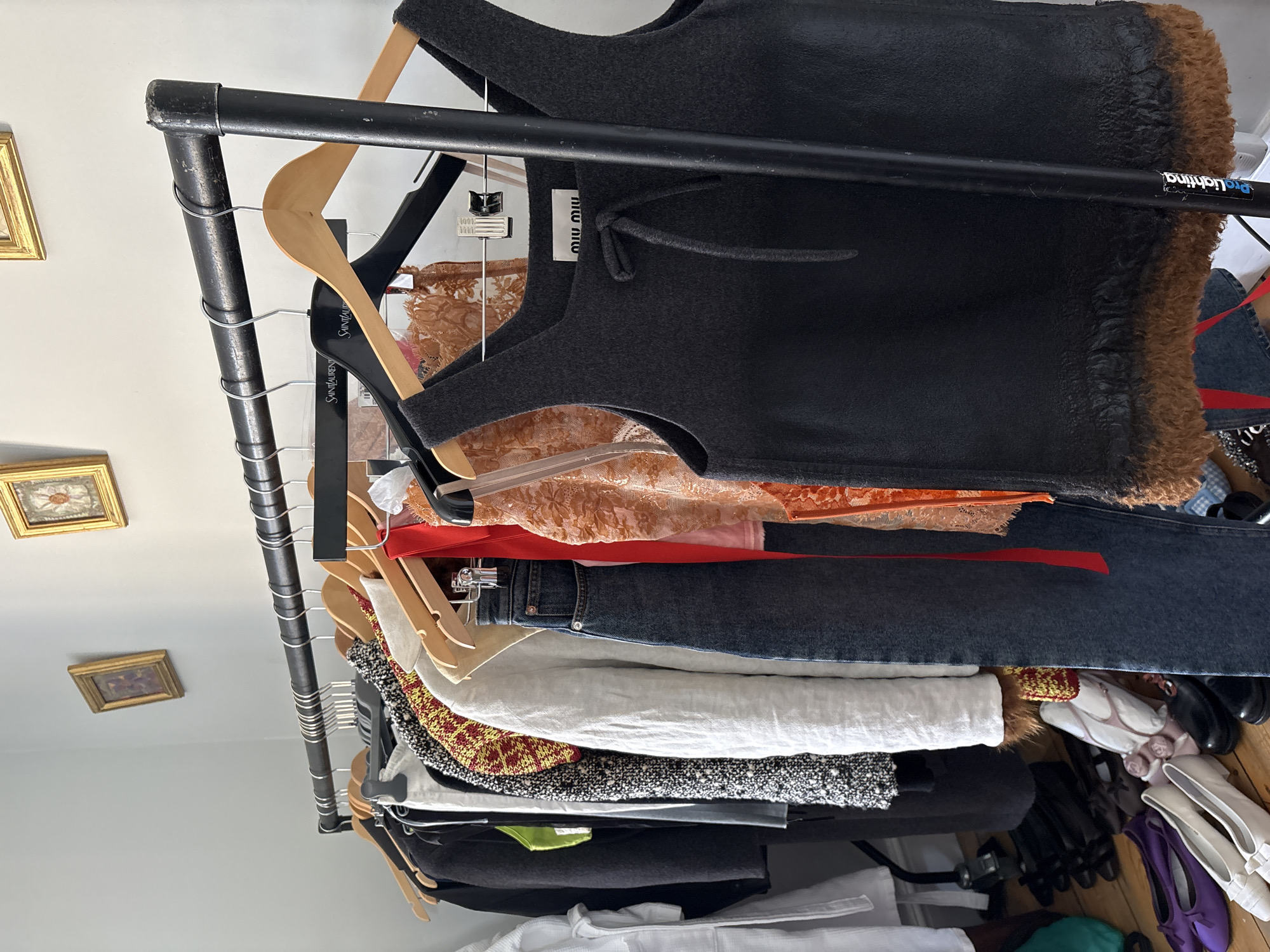 London OOTD prep: clothing rack and hashtag graphic