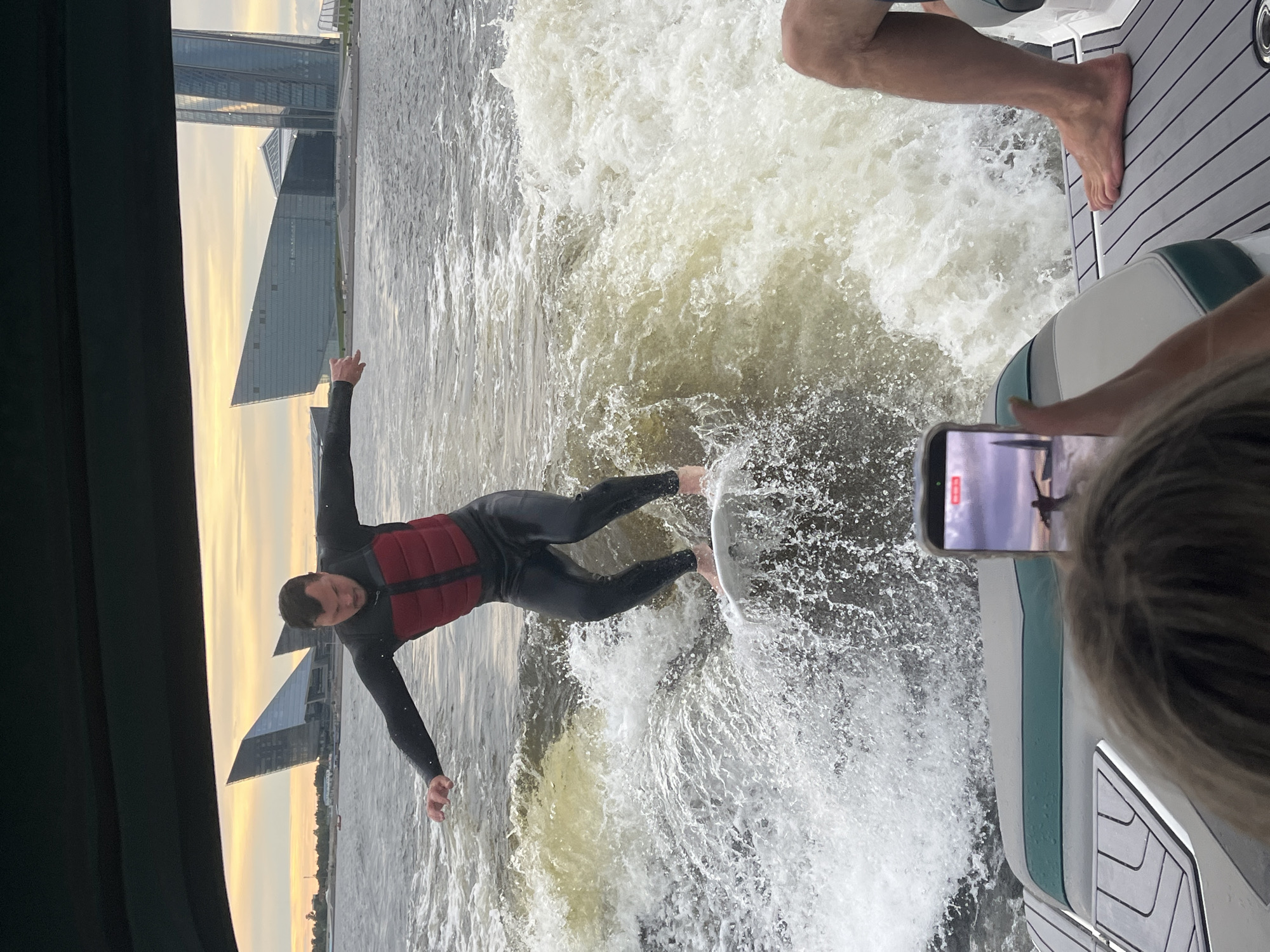 Wakeboarding on a Saint Petersburg waterway on a summer evening