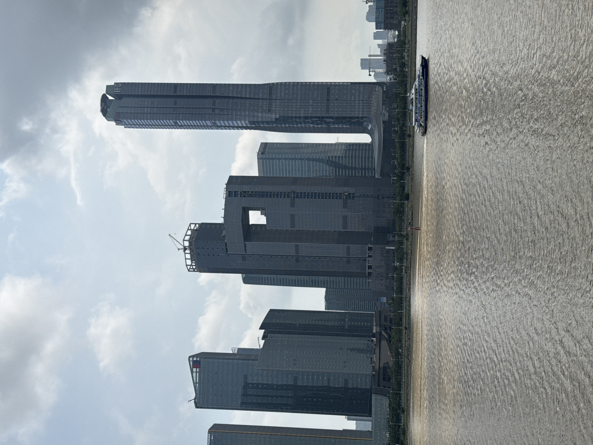 Morning views document Macao waterfront skyline construction activity