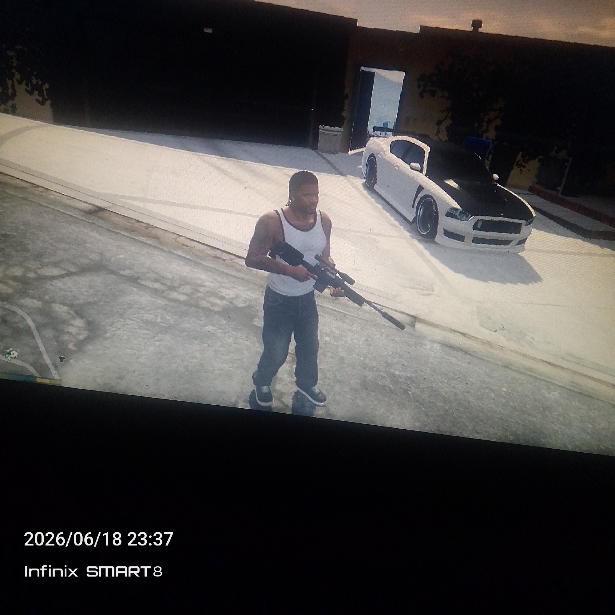 Armed figure moves through urban streets and cars at night