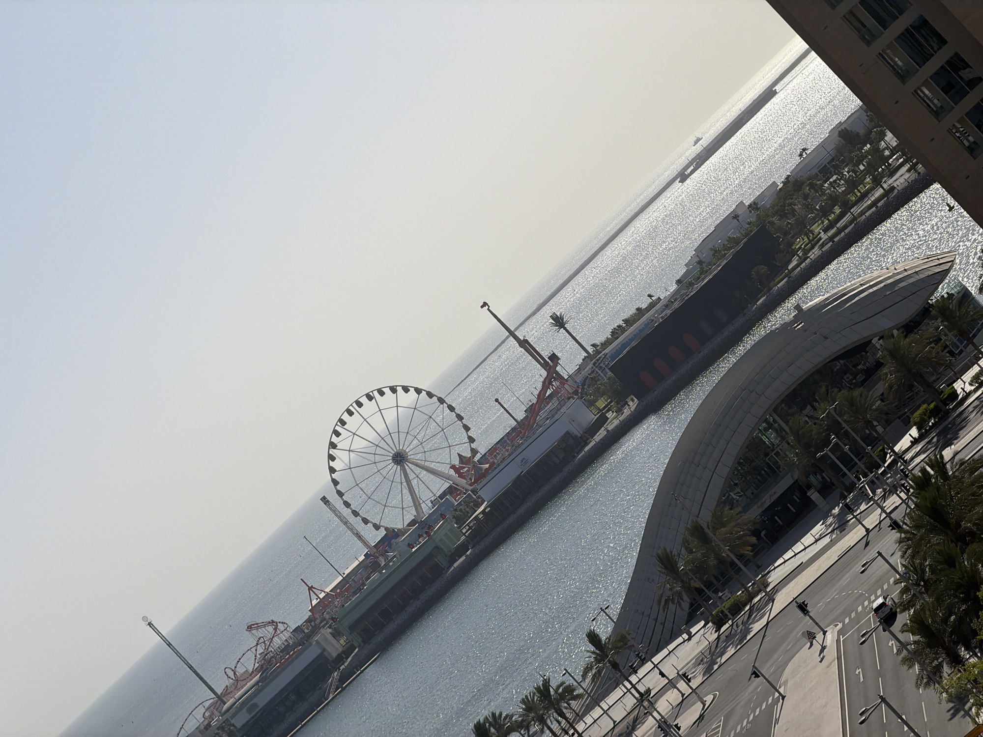Urban morning scenes captured across waterfront amusement district