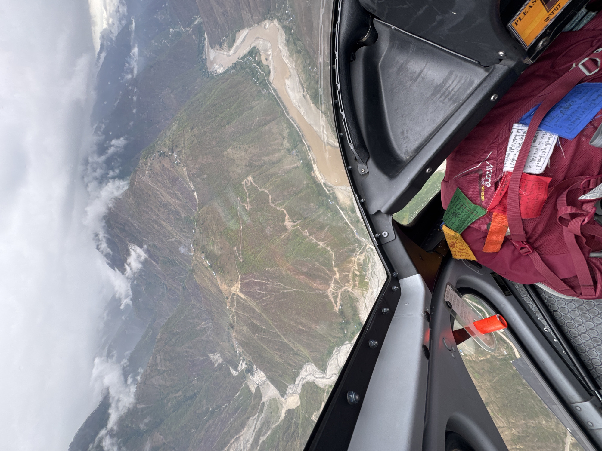 Aircraft passenger captures aerial view over Nepal mountains