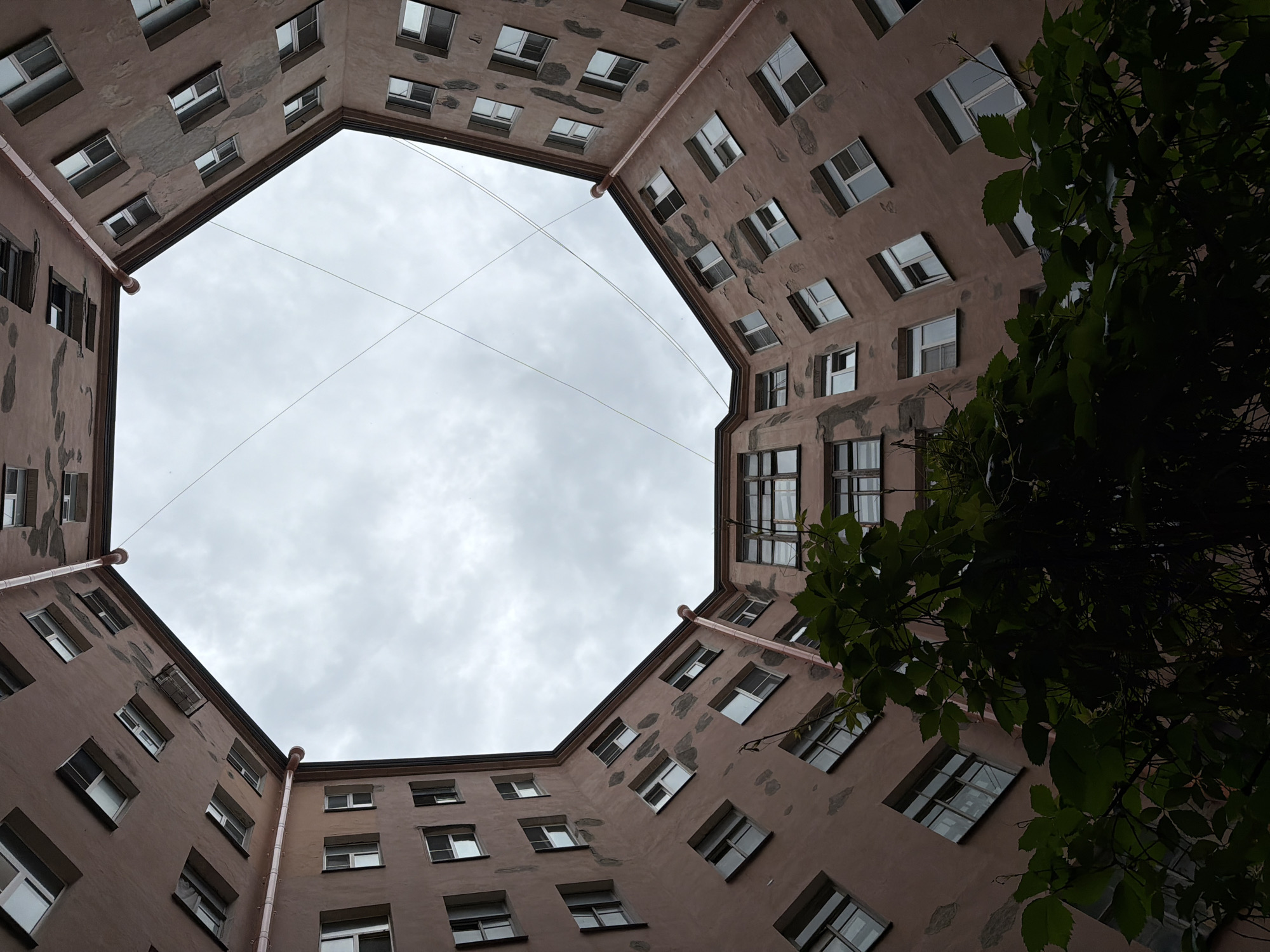 Looking up through a Saint Petersburg well courtyard