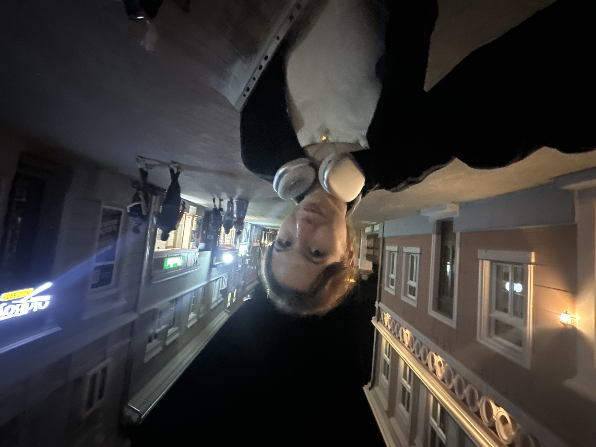 Woman documents nighttime walk through downtown Novi Sad with selfies