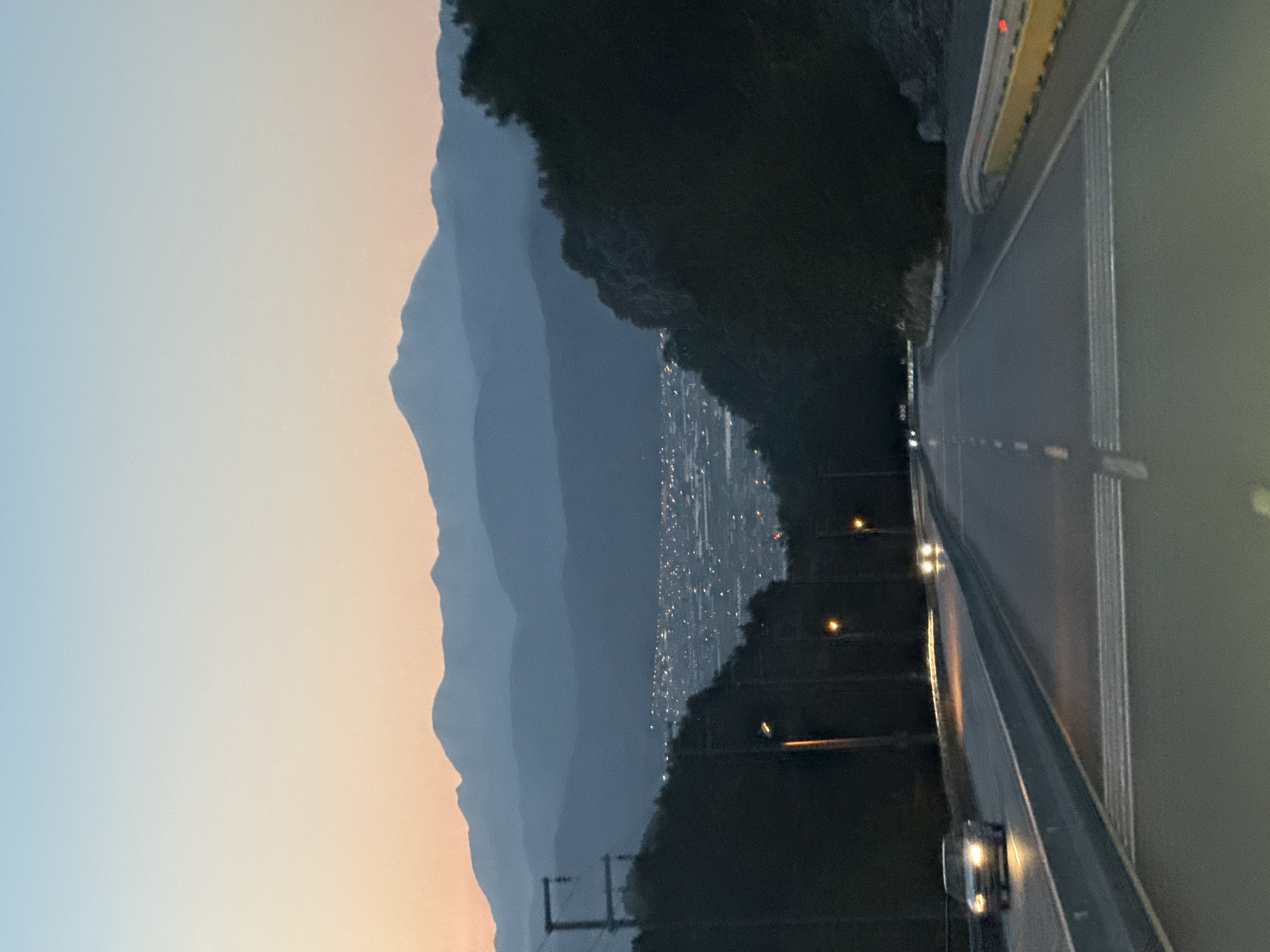 Evening traffic flows through Fethiye as dusk settles