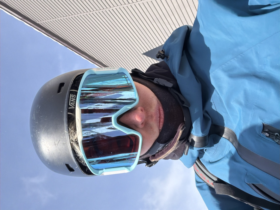 Skiers gather at Niseko resort on sunny winter day