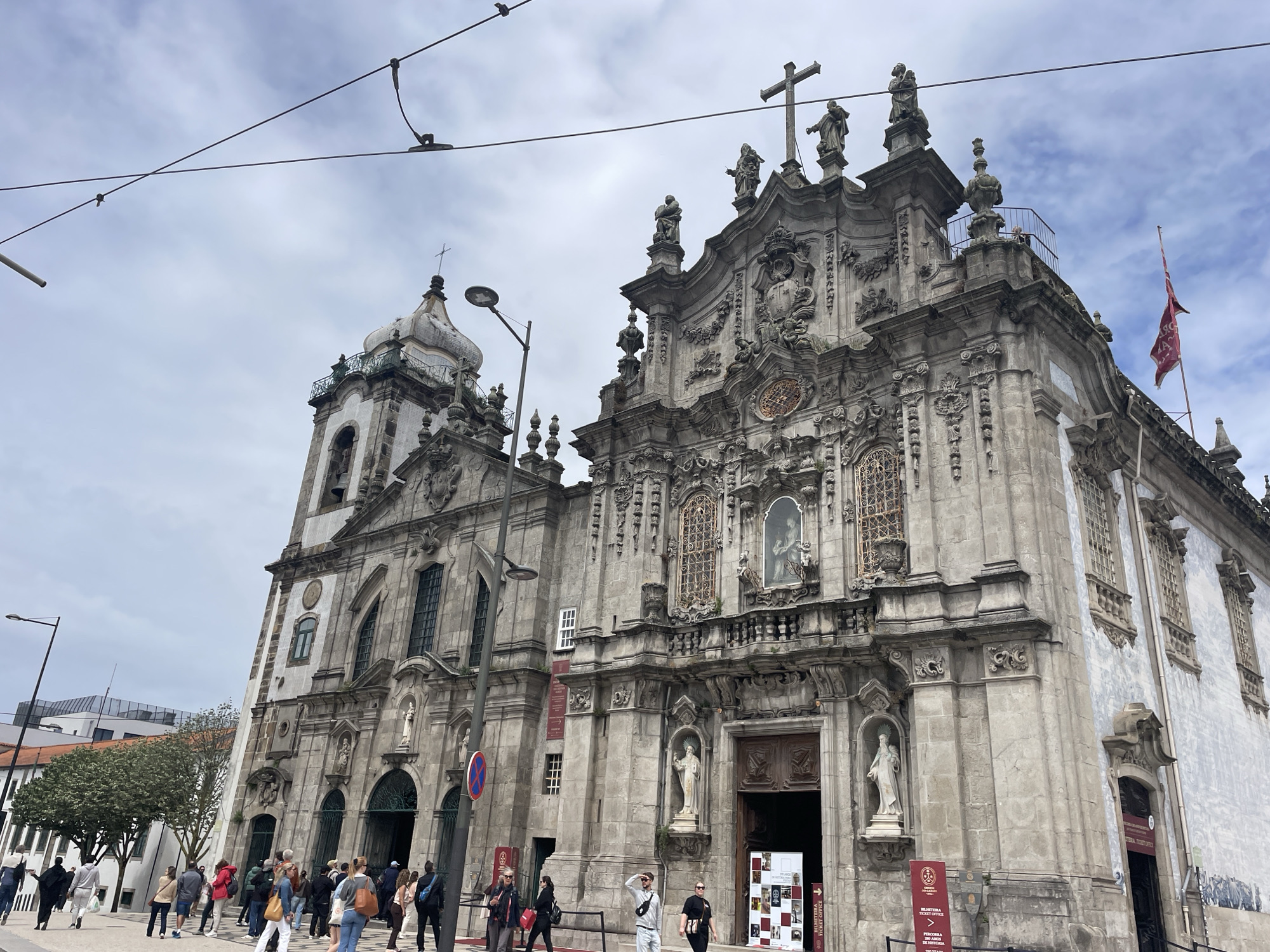 Porto scenes documented: historic church, colorful streets, bakery activity