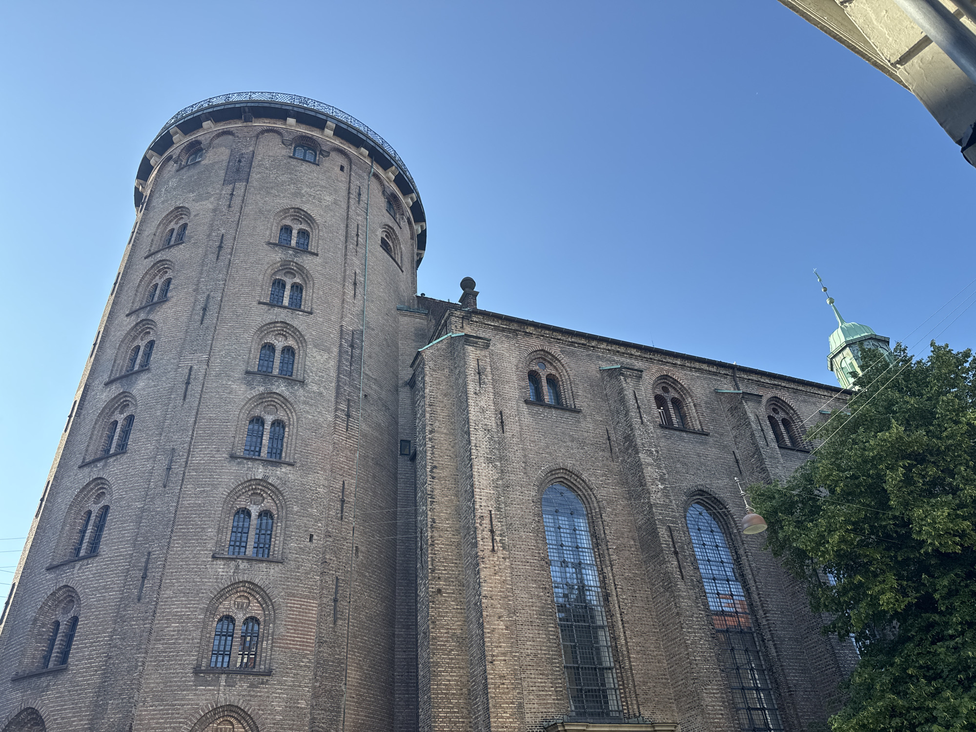 Copenhagen afternoon: Round Tower, record shops, and tuxedos at a fountain