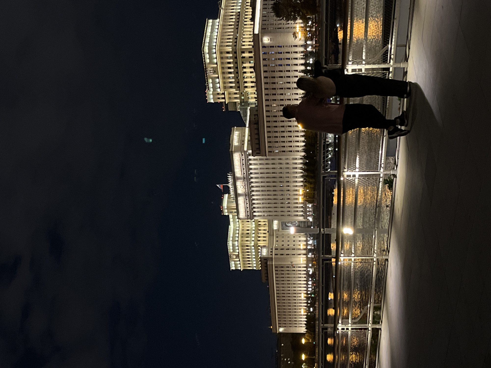 Evening photography session captures illuminated Moscow architecture and figures