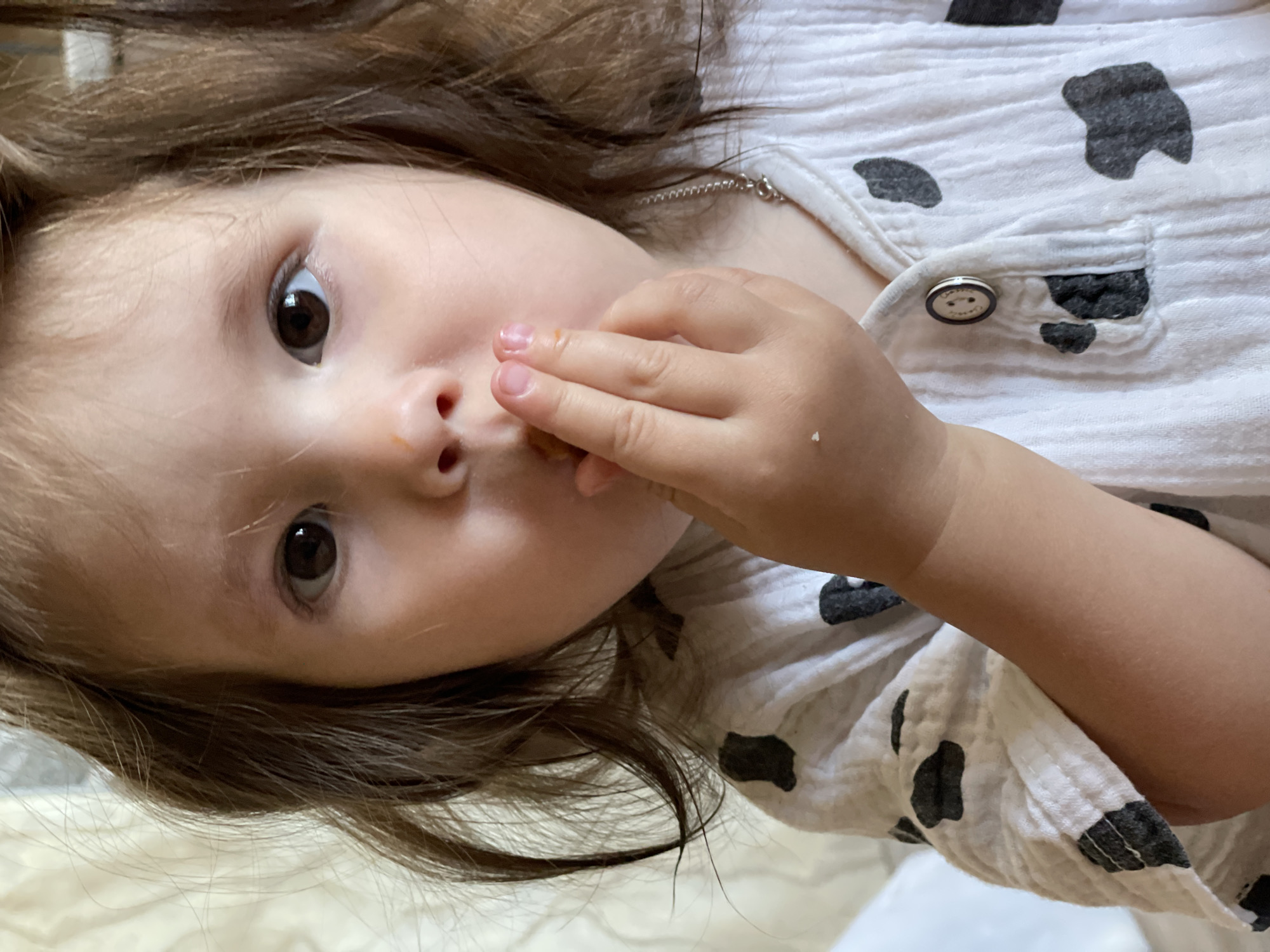 Child in cow print shirt photographed in Izhevsk