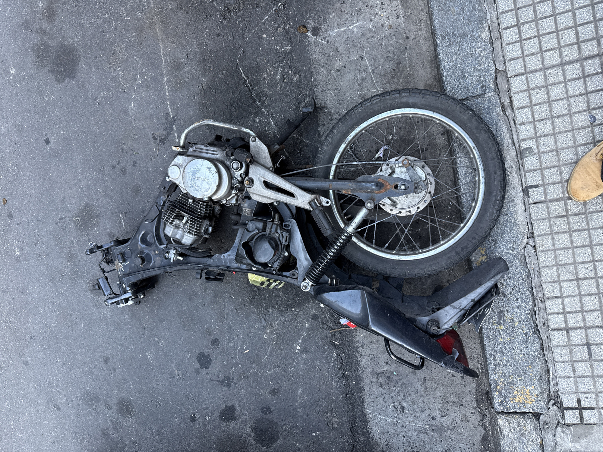Stripped motorcycle frame, decorated car spotted on Buenos Aires street