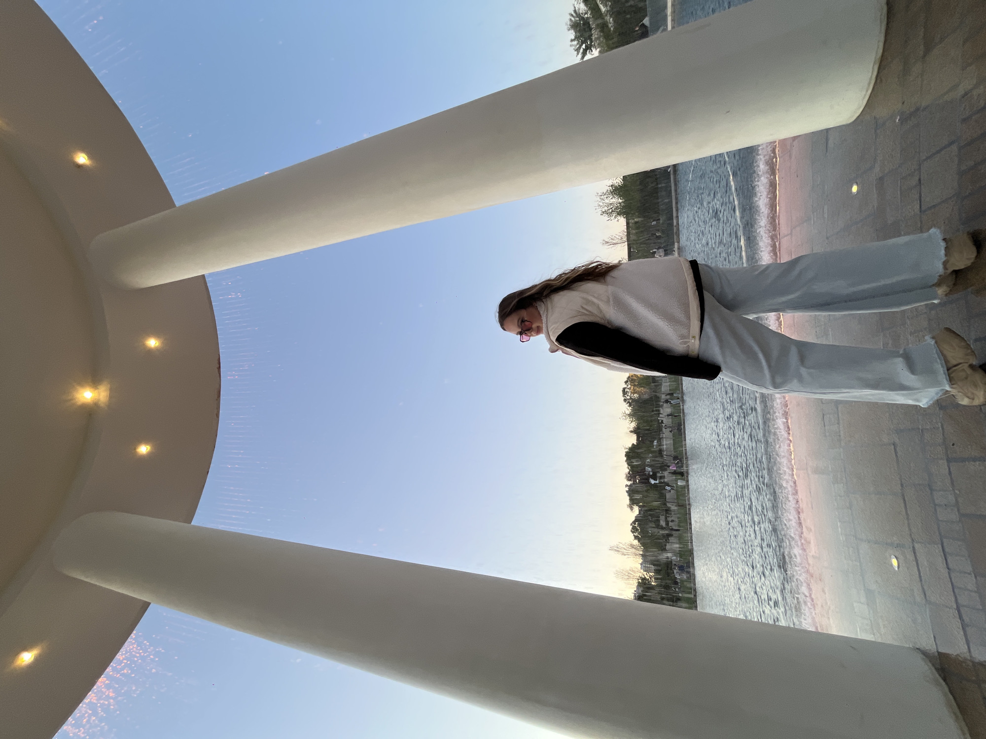 Visitors photograph at illuminated circular structure in Krasnodar