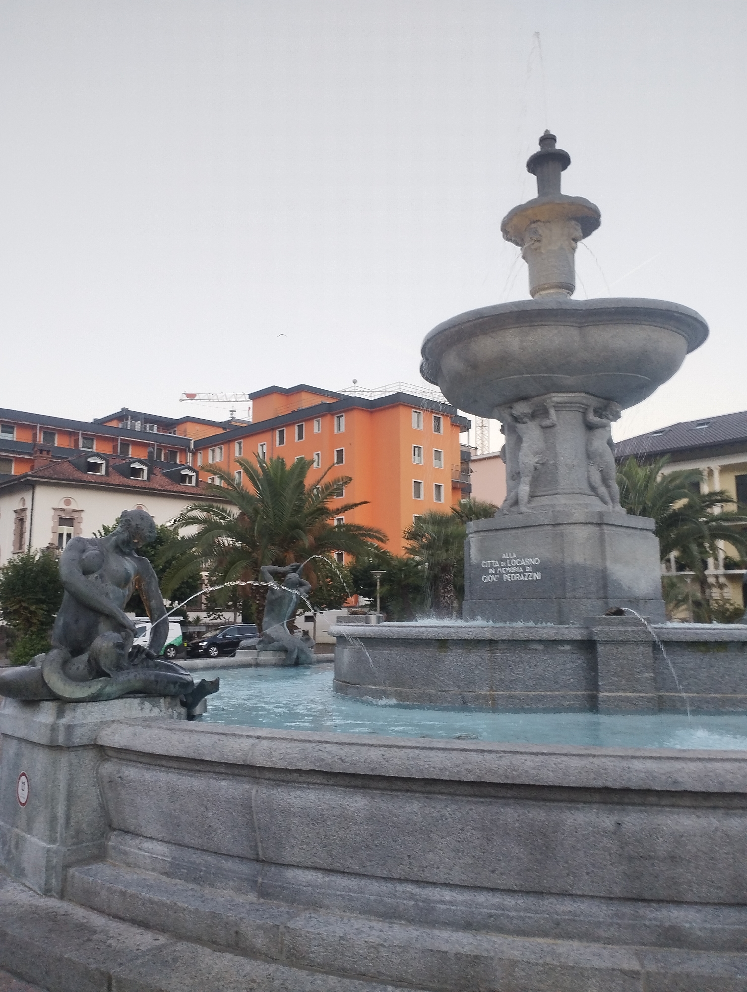 Evening stroll through Locarno's streets, fountains, and architecture