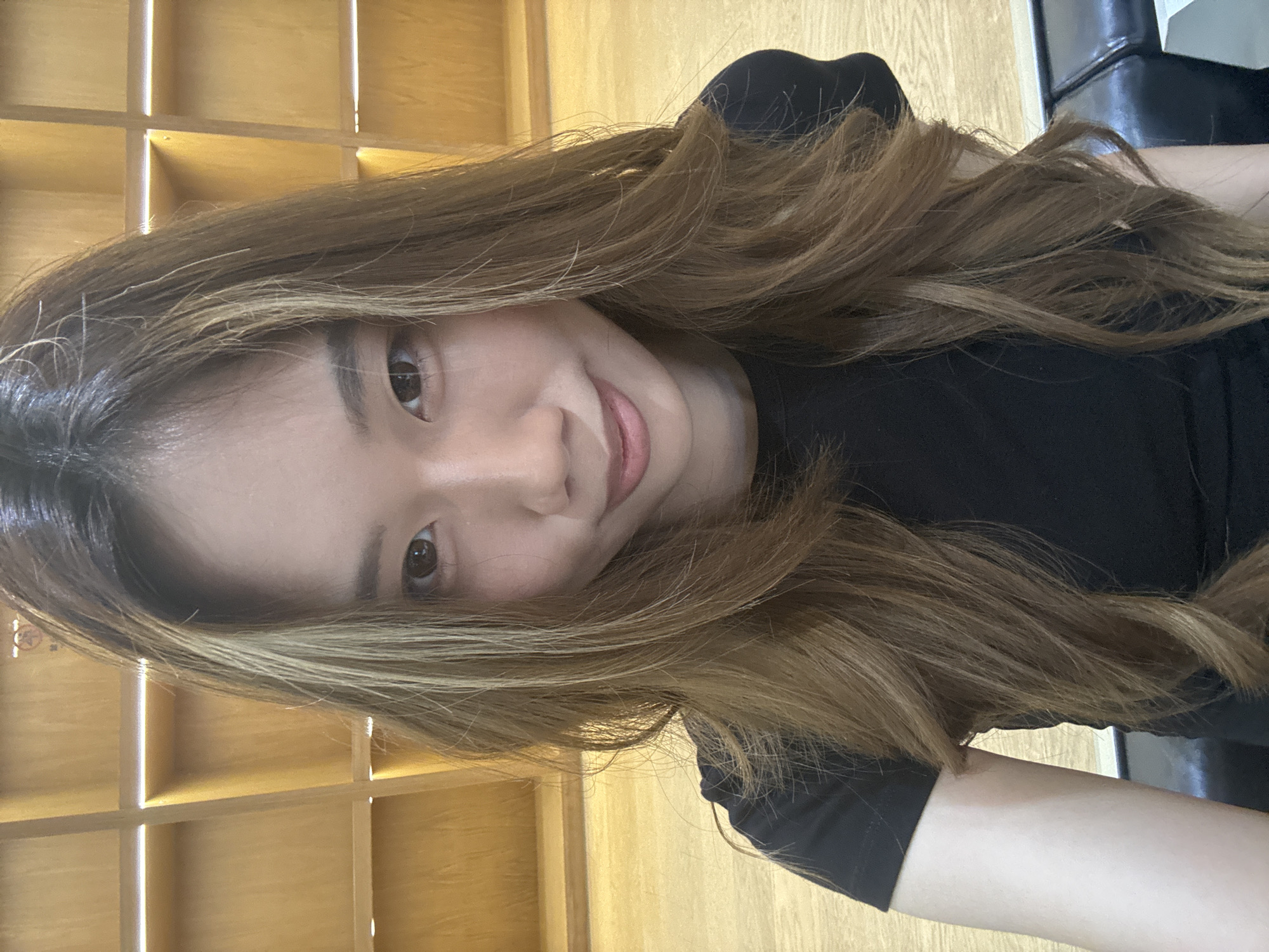 Woman takes selfies indoors in Nan'an District, China