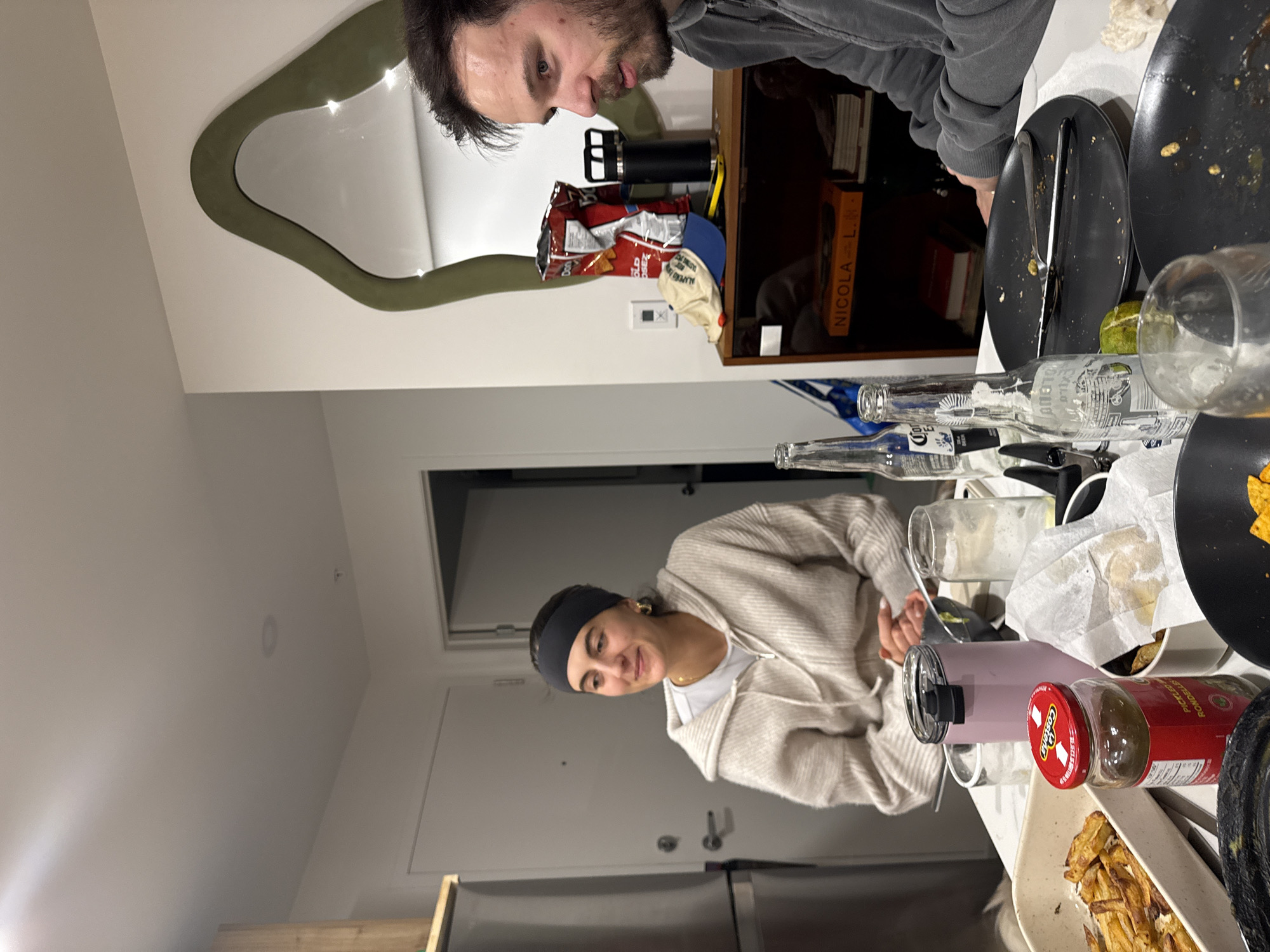 Casual indoor gathering with food and drinks in Laval