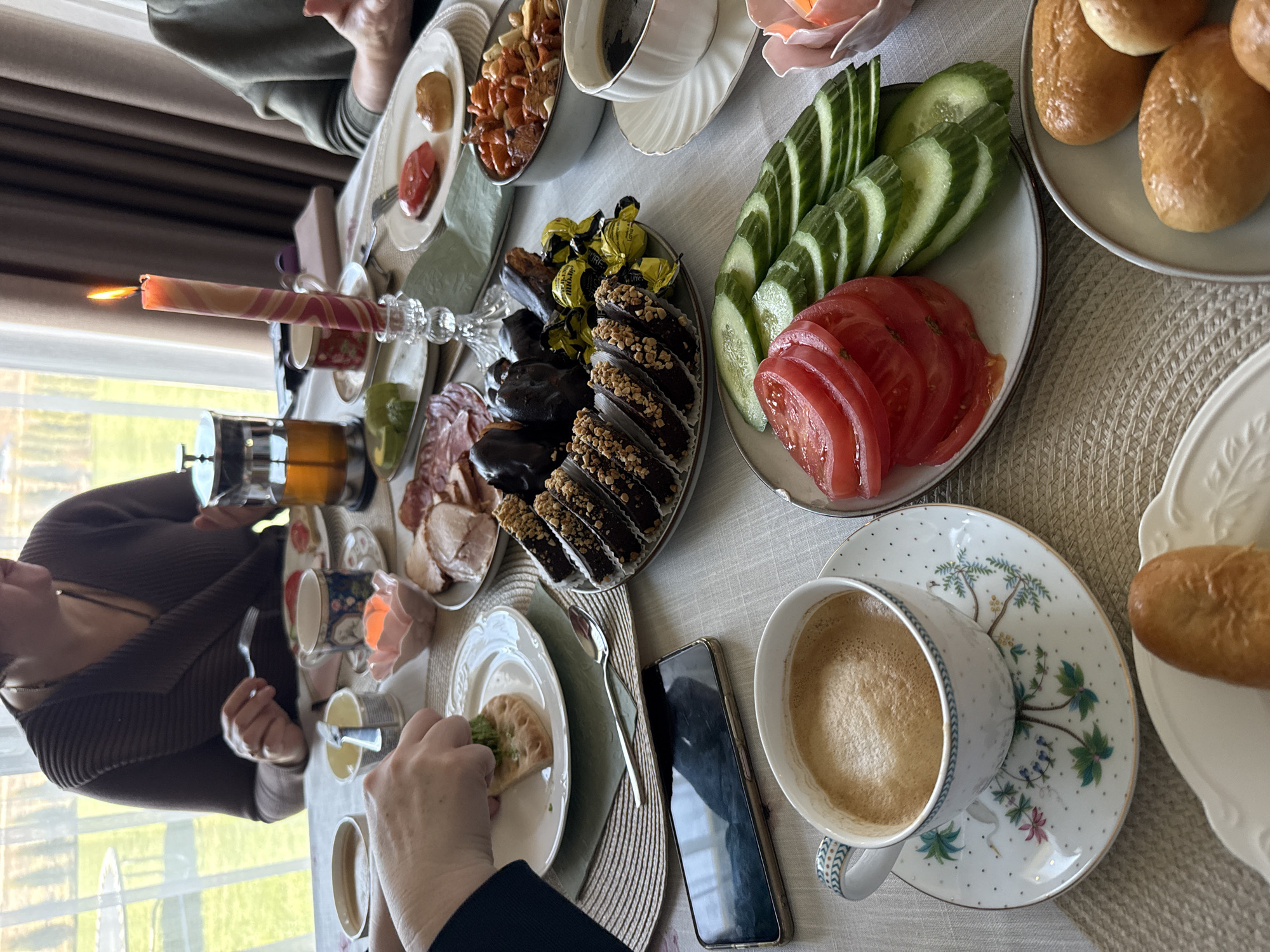 Morning meal gathering documented in Saurieši, Latvia home