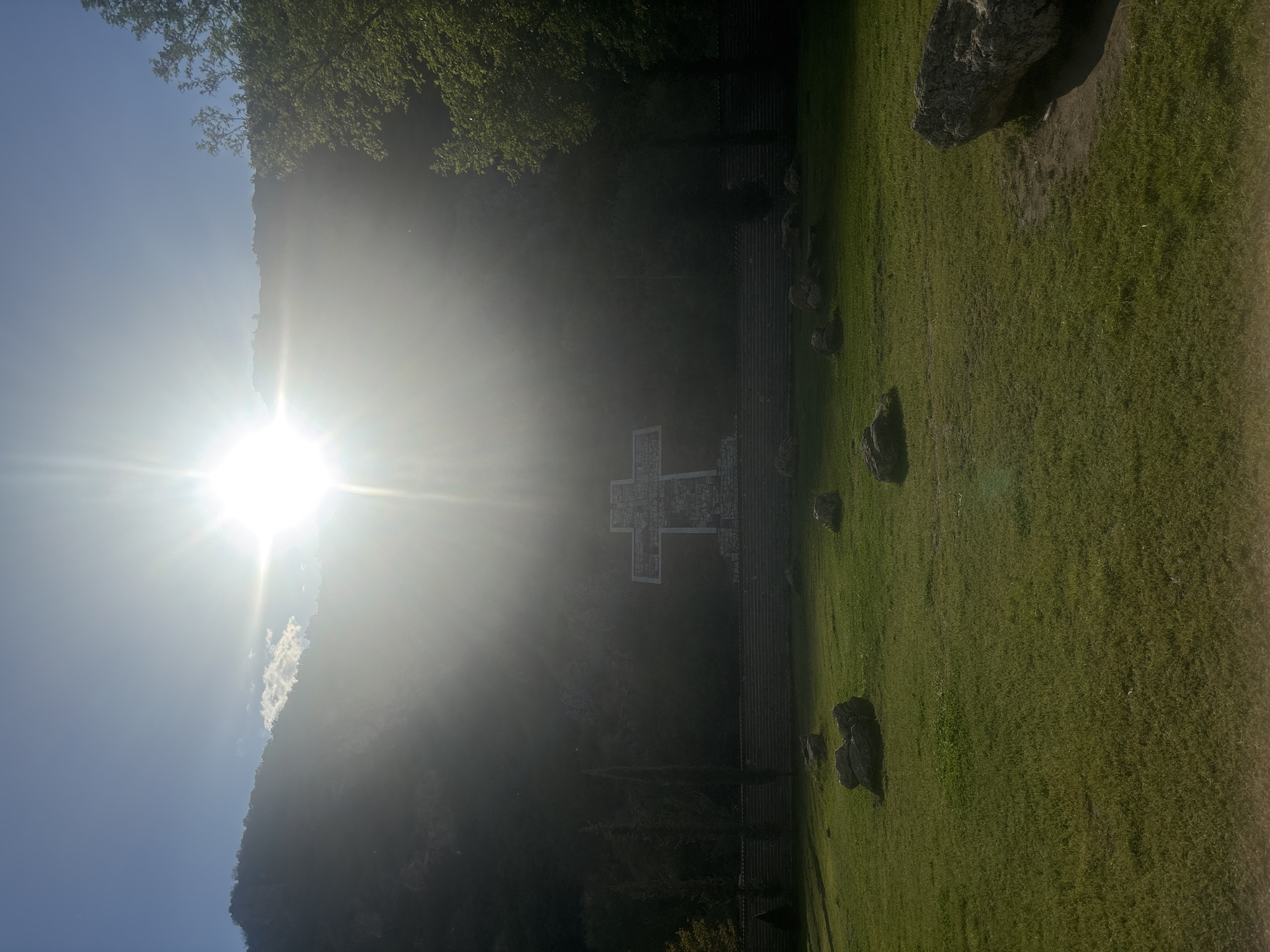 Stone memorial cross documented at hillside site in Bulgaria