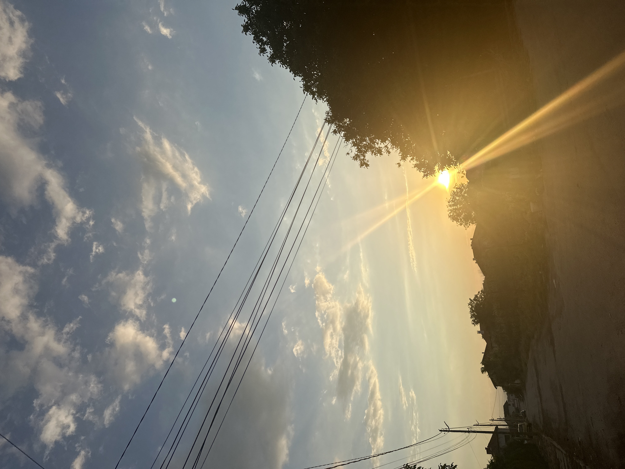Sunset dog walk through quiet village streets in Malevo, Bulgaria