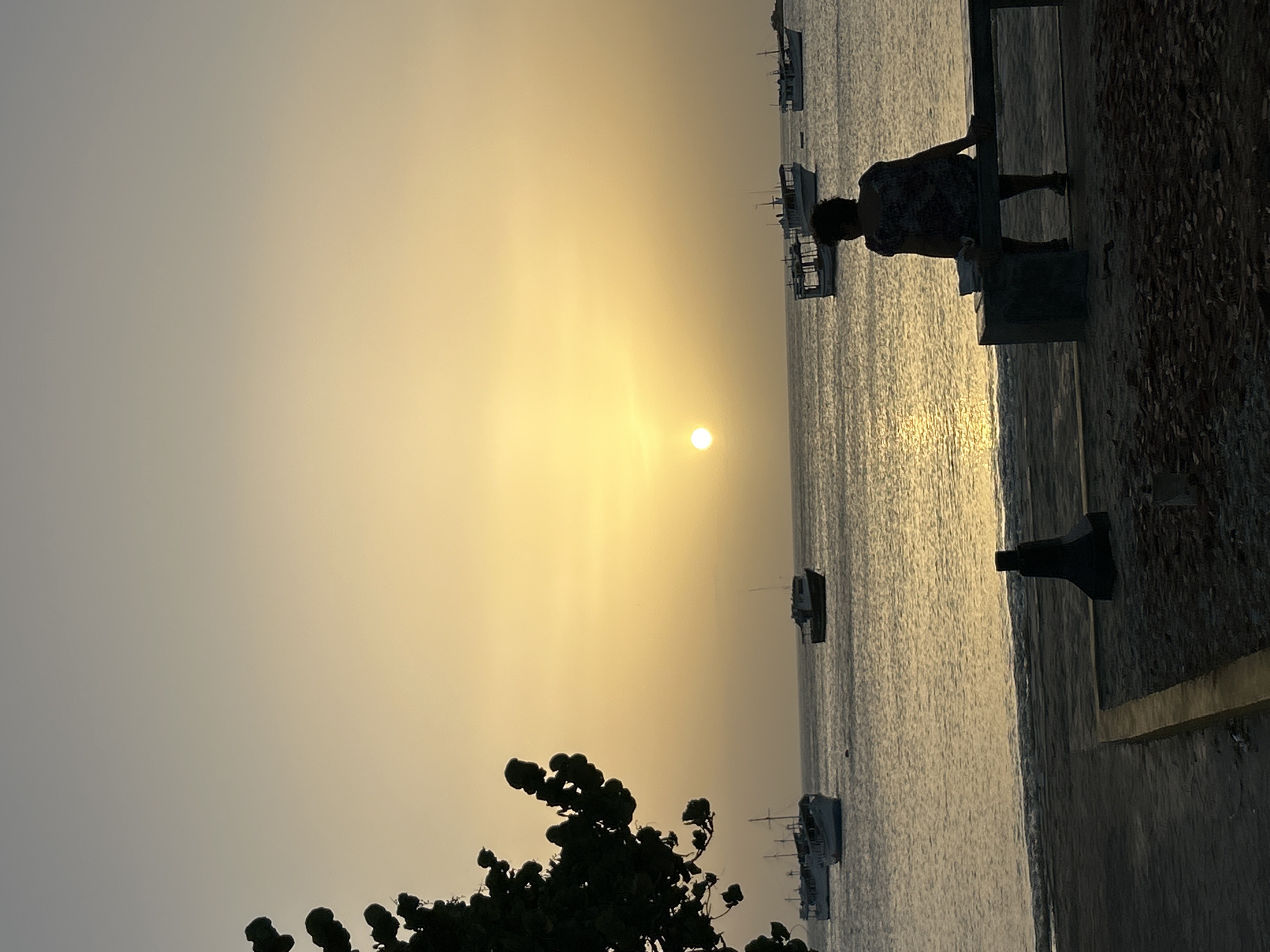 Evening coastal life captured in Juan Griego, Venezuela