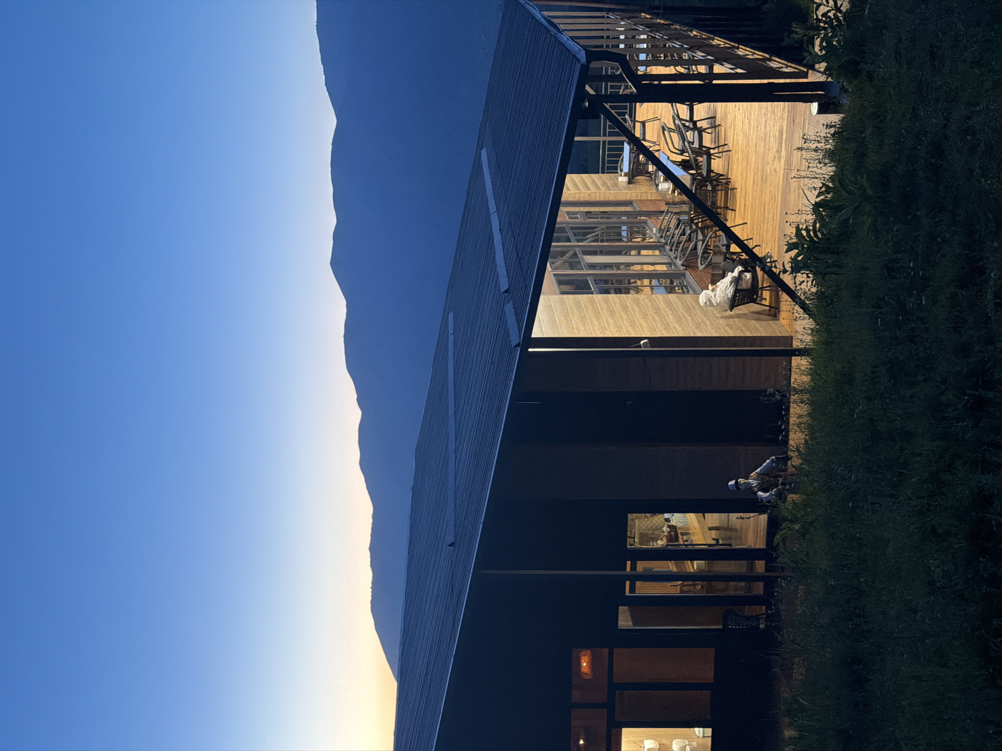 Yurt camp at dusk in Kyrgyzstan's mountain valley
