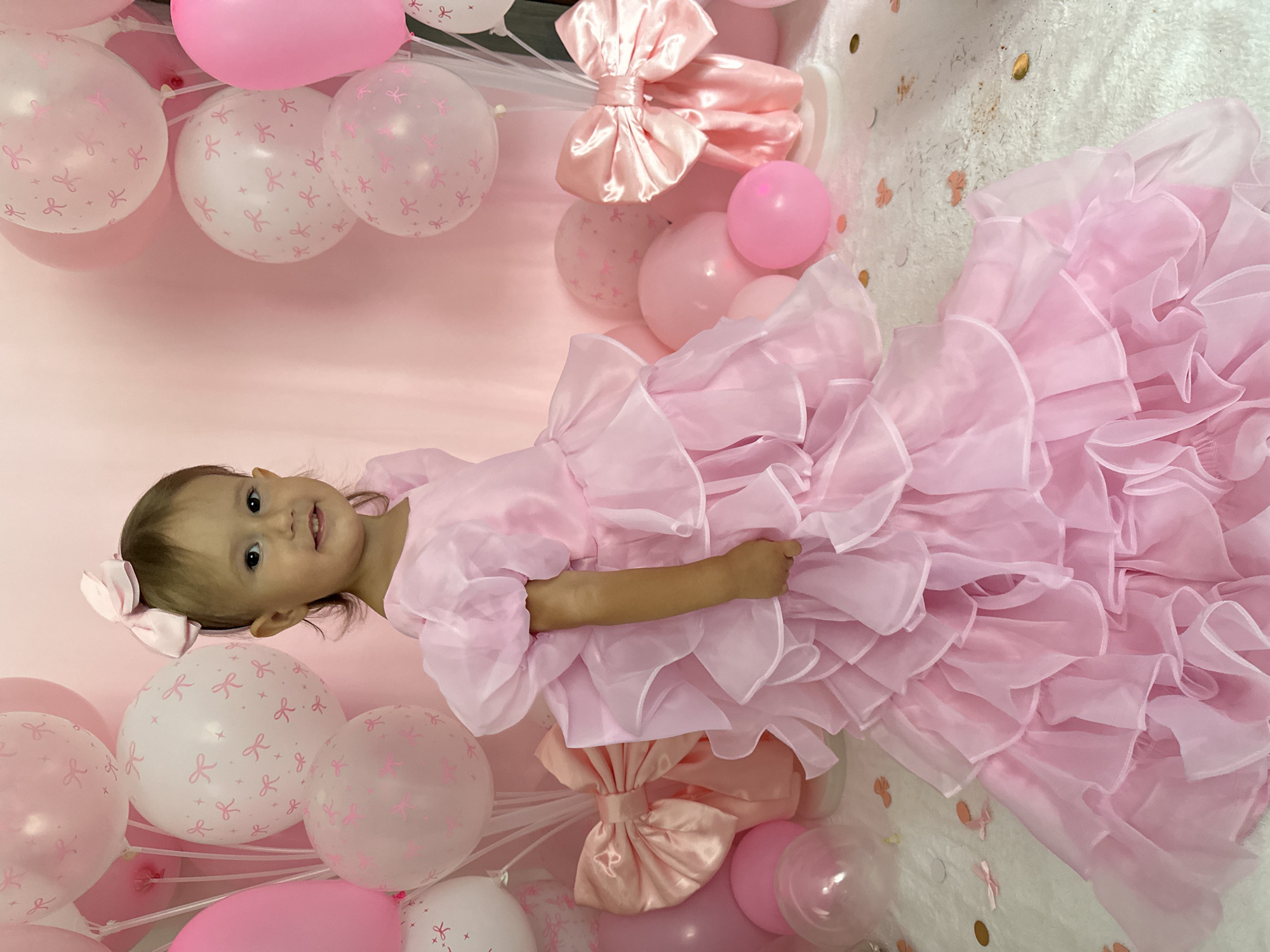 Pink costume contest photoshoot with balloon backdrop in Wisła