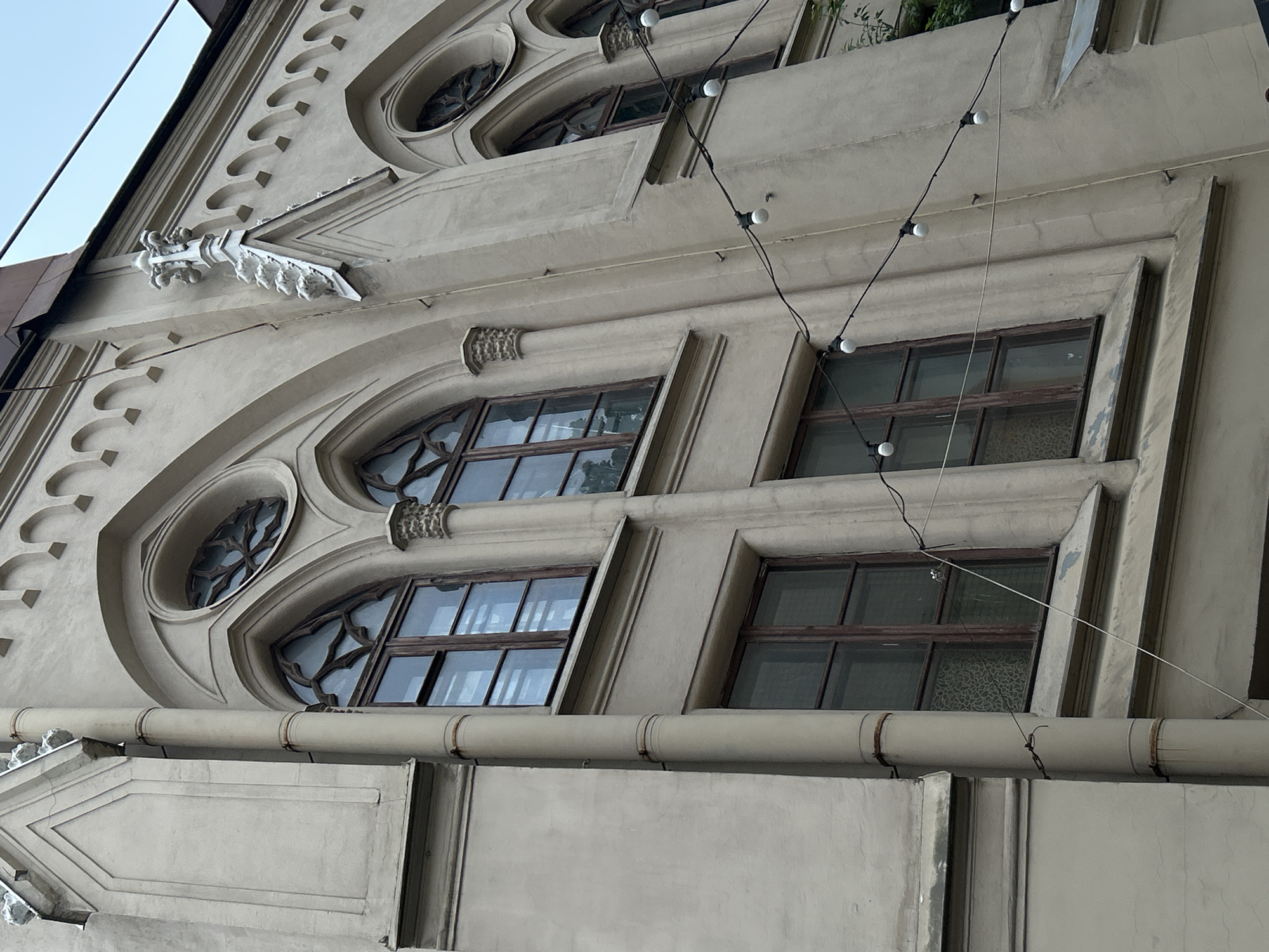 Woman in pinstripe suit observed near historic Saint Petersburg buildings